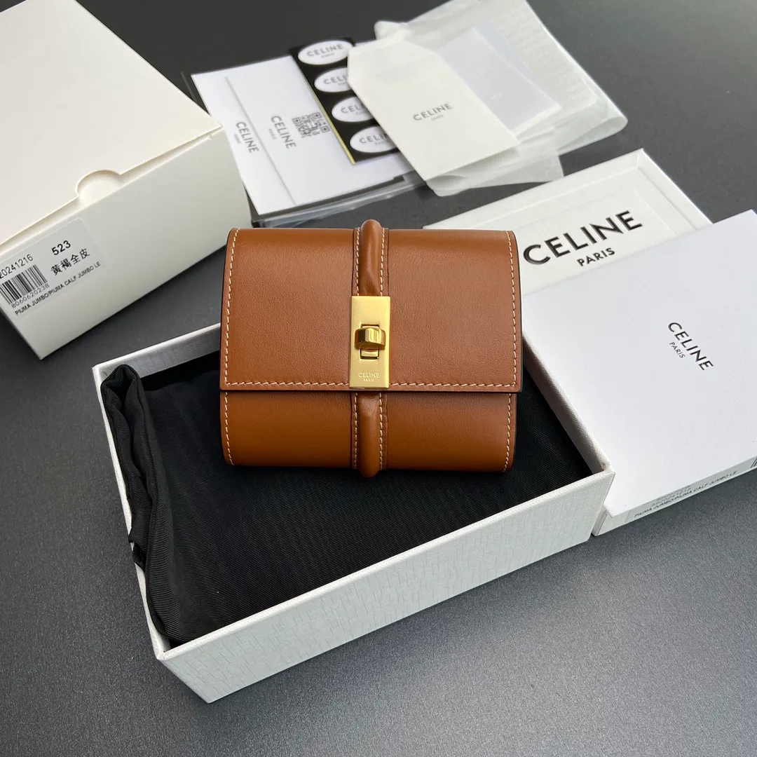 [Extra-grade pure steel hardware original leather] ¥800 TRIOMPHE shiny cow leather wallet cow leather cow leather lining rotating lock closure 5 card slots 1 folding coin bag with snap button 1 flat pocket 1 banknote bag No.: 10M523GCG.04LU 523 523 Tan full leather Size: w10.5×9×3cm.