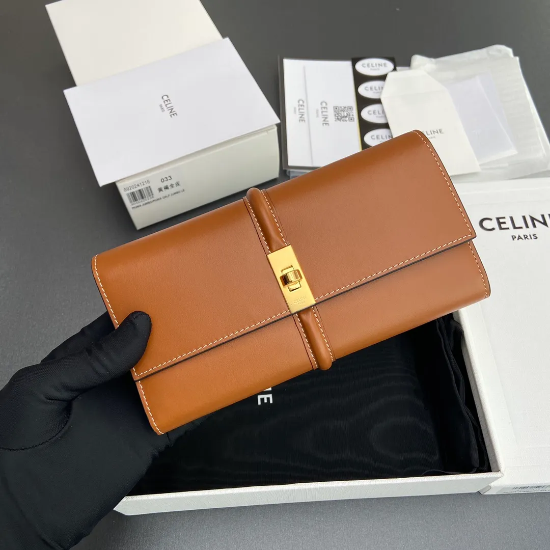 [Extra-grade pure steel hardware original leather] ¥840 TRIOMPHE16 glossy cow leather wallet cow leather cow leather lining/fabric gold finish rotating lock closure 1 zipper coin pocket 12 card slots 1 banknote pocket 2 gusseted compartments No.: 10M033CQ7.04LU033 033 Yellow brown full leather Size:w10.2×h7.5×d2.5cm