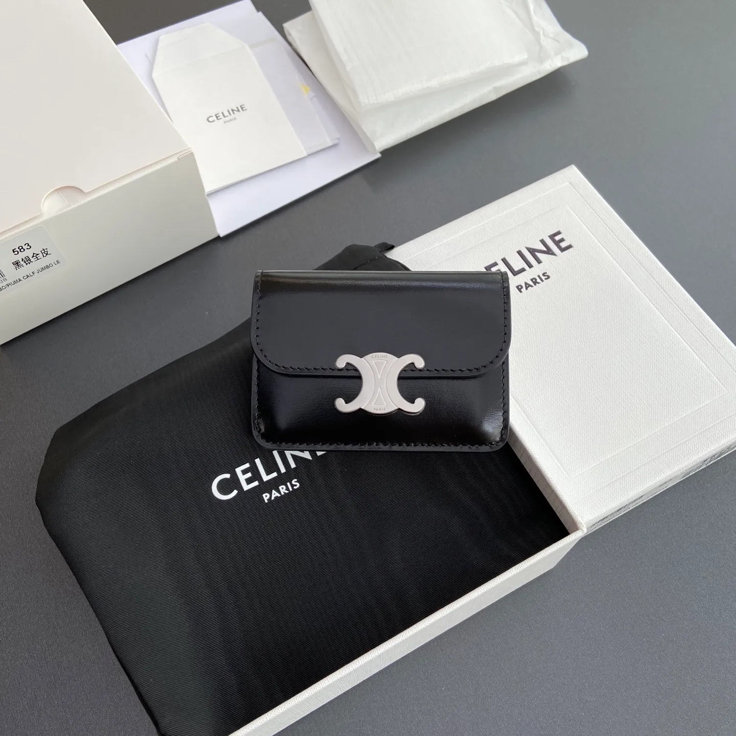 [Extra-grade pure steel hardware original leather] ¥560 TRIOMPHE glossy cow leather flip card holder/snap button closure 1 main compartment 2 inner card slots 1 inner flat pocket 1 outer flat pocket Number: 10I582CPJ.04LU 583 Black Silver Size: w10×h7.5×d2cm