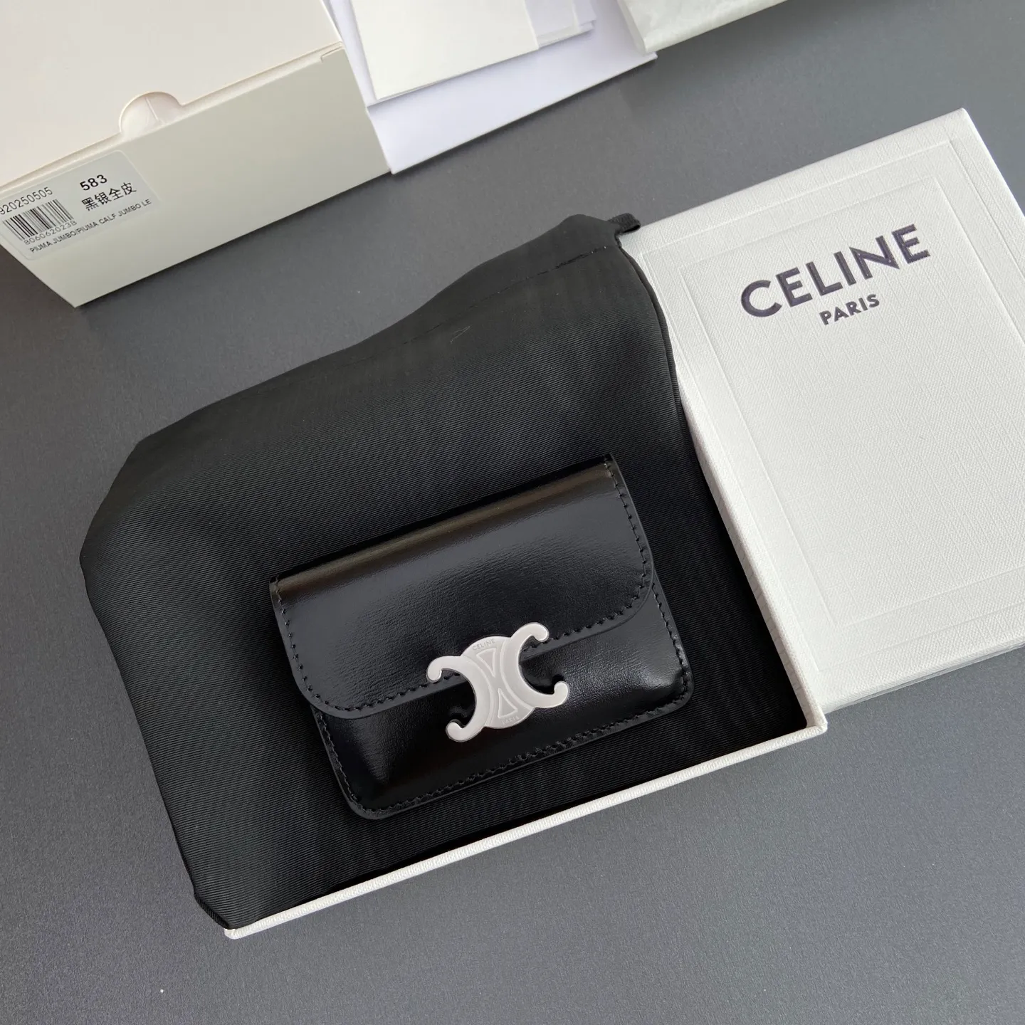 [Extra-grade pure steel hardware original leather] ¥560 TRIOMPHE glossy cow leather flip card holder/snap button closure 1 main compartment 2 inner card slots 1 inner flat pocket 1 outer flat pocket Number: 10I582CPJ.04LU 583 Black Silver Size: w10×h7.5×d2cm