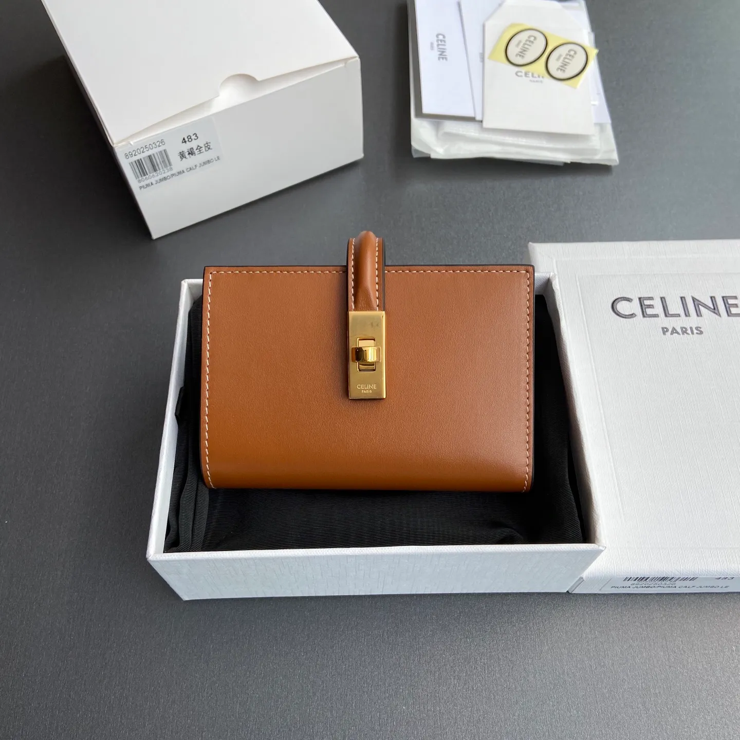 [Extra-grade pure steel hardware original leather] ¥840 TRIOMPHE16 glossy cow leather wallet cow leather cow leather lining/fabric gold finish rotating lock closure 1 detachable zipper movable coin pocket 7 card slots 1 banknote pocket 4 gusseted compartments No.: 10M483CQ7.04LU483 483 Tan full leather Size:w12.7×h9×d2.5cm
