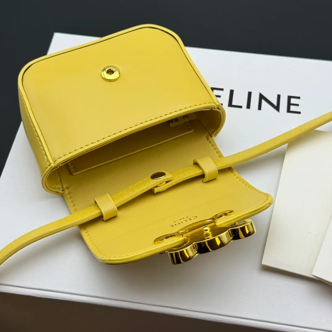 💰230 💎Upgraded original version💖 Comes with gift box 𝗖𝗘𝗟𝗜𝗡𝗘 | 𝗧𝗥𝗜𝗢𝗠𝗣𝗛𝗘 𝗠𝗜𝗡𝗜 Arc de Triomphe Mini Crossbody Bag〰️ Yellow# (Calfskin) Arc de Triomphe and minimalist inspiration collide. Beautiful to the core. The shape of the bag is simply the golden ratio. Small and delicate. The more you look at it, the better it looks. It gives people a French gentle style🍃. Carrying it on the body is like an exquisite work of art. Made of genuine Italian leather. The texture of the leather is perfect. 𝑠　𝑧𝑒: 𝟭𝟭*𝟴*𝟰𝒄𝒎 Model: 101513/10I513
