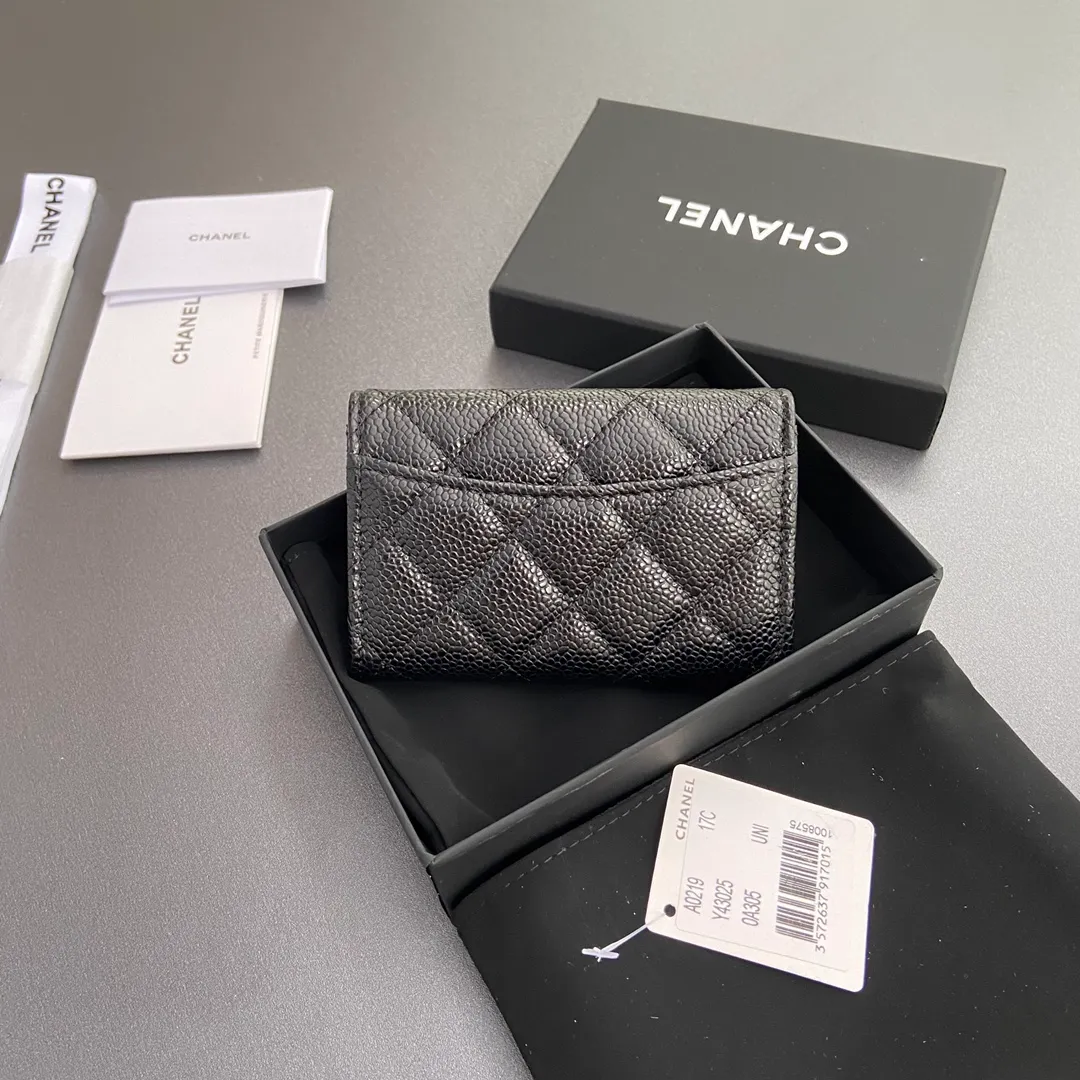 Xiaoxiang imported Italian leather Item number: AP438 (inner compartment with zipper) 💰: 280 Size: w11×h7cm Color: black ball pattern golden steel mark