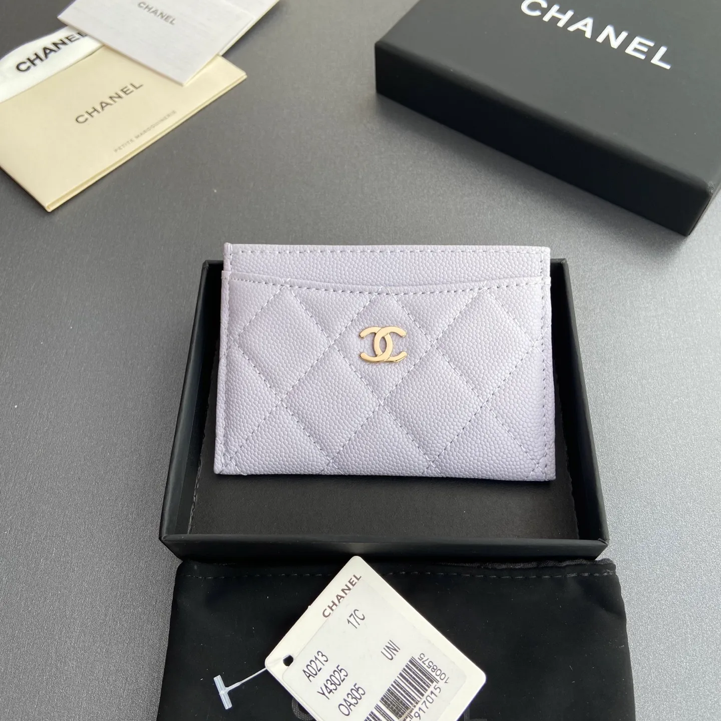 Xiaoxiang imported Italian leather Item number: A31510 0213 Price: 190 Size: w11×h7.5cm Color: Light purple ball pattern gold steel mark