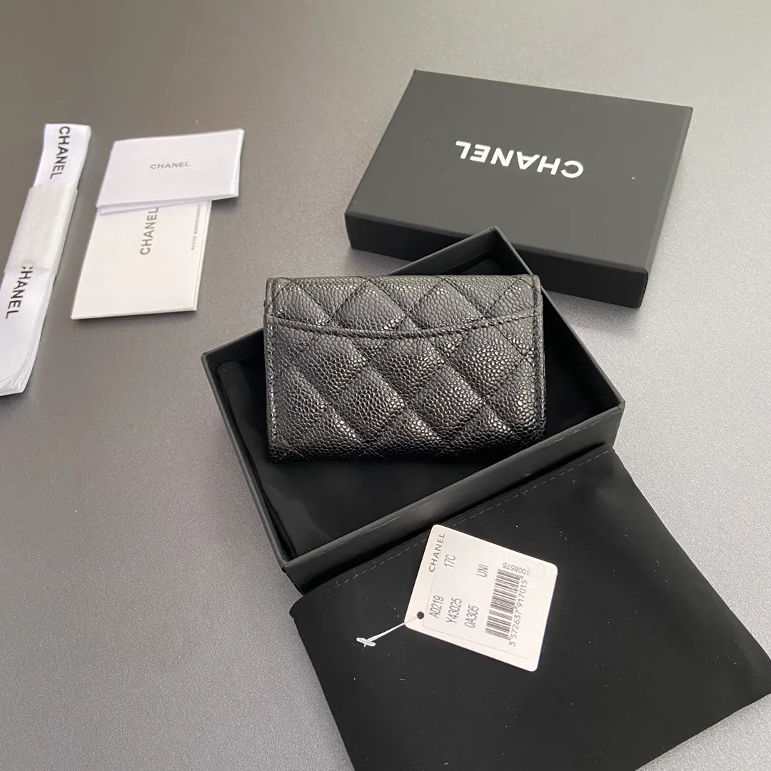 Xiaoxiang imported Italian leather Item number: AP438 (inner compartment with zipper) 💰: 280 Size: w11×h7cm Color: black ball pattern silver steel mark