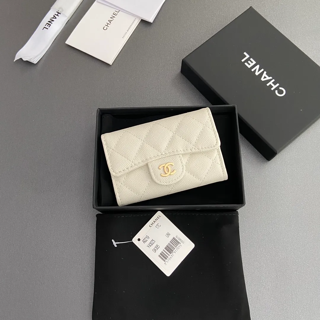 Xiaoxiang imported Italian leather Item number: AP438 (inner compartment with zipper) 💰: 280 Size: w11×h7cm Color: white fine ball pattern golden steel mark
