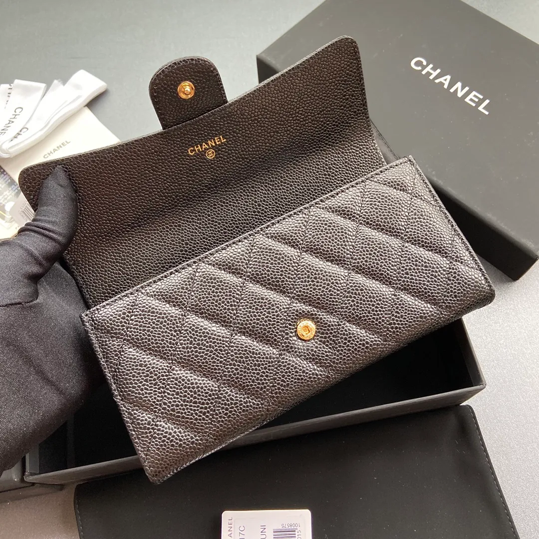 Xiaoxiang imported Italian grained cowhide Item No.: A0241 Long clip with back pocket on the back Price: 480 Size: w19×h10.5×3cm Color: Black ball pattern gold steel mark