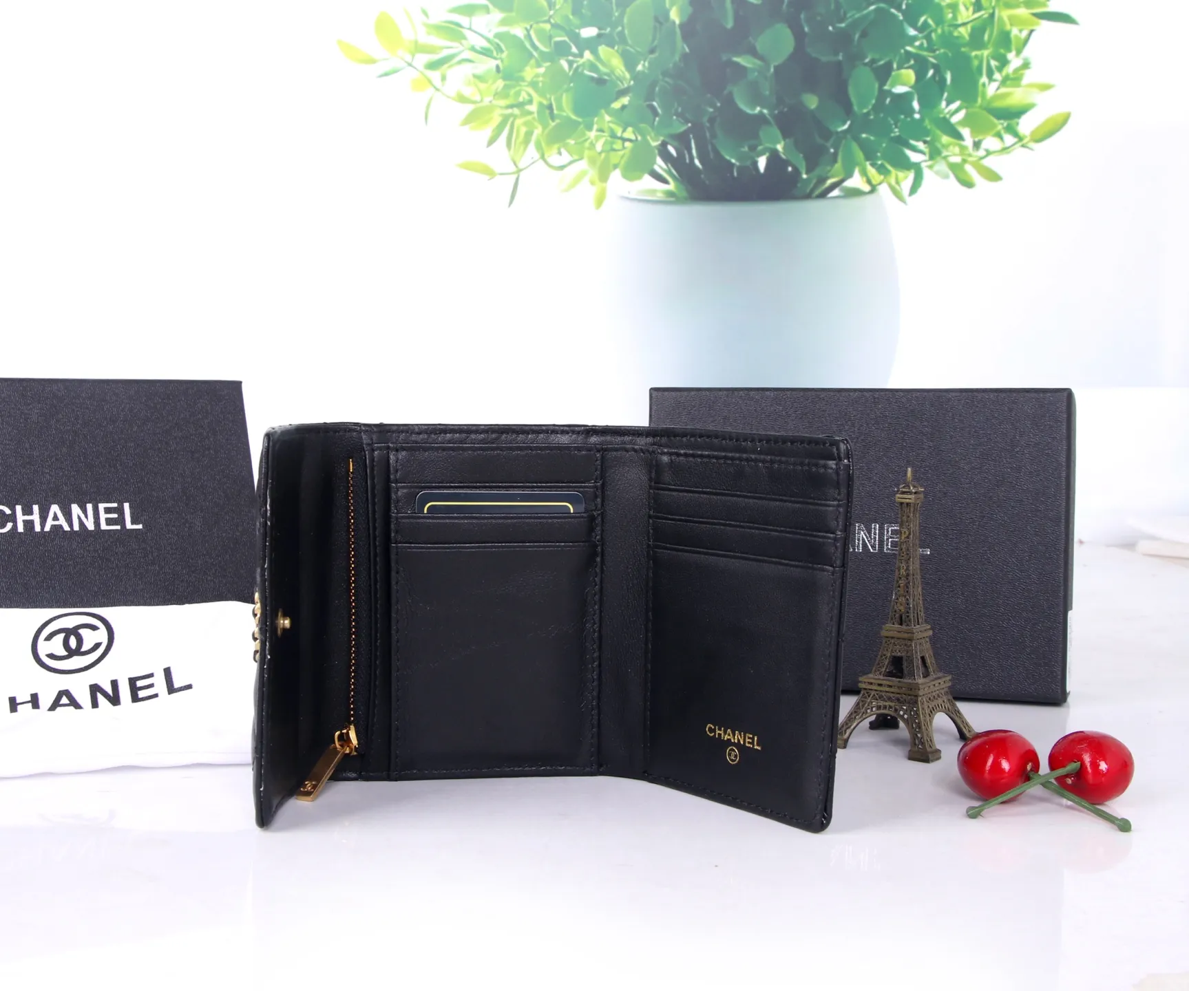 P170 Style No.: 803 Brand: Chanel Color: Black Maroon Size: 11*10*2 Description: Chanel’s autumn and winter new styles are now available! Made of first-layer sheepskin inside and outside, the workmanship is exquisite, comparable to that of counters! Multifunctional tri-fold small wallet, super practical!
