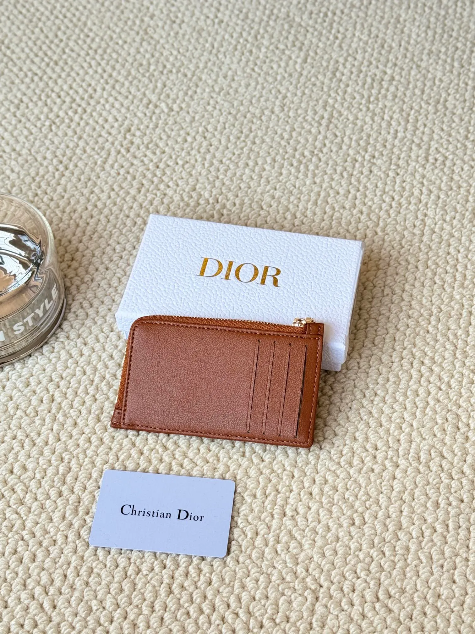 💰160Lady Dior Card Holder Sand color wallet I bought for the purpose of holding a discarded bag, L-shaped opening, seven-zig card holder pull No.: S5131 There are too many front pockets to hold cards. The banknotes need to be folded 40% off, 30% off can be placed but it has a zipper. The size is 13.5*8.5*1.5 cm. The Dior card holder meets my various needs. Compared with other styles, it is thin, compact and has a large capacity. There is no conspicuous big LOGO, it will not scratch when placed in the bag, and it is relatively low-key and classic. There is a special place for access control cards, so you don’t need to mix them with bank cards. When I used to swipe access control cards, I couldn’t swipe them because there were too many cards, so I had to take out the access control cards separately. There is a zipper, so you don't have to worry about putting important things out, and the zipper is half-open, so it's more convenient to put things in and take things out than having only one side.