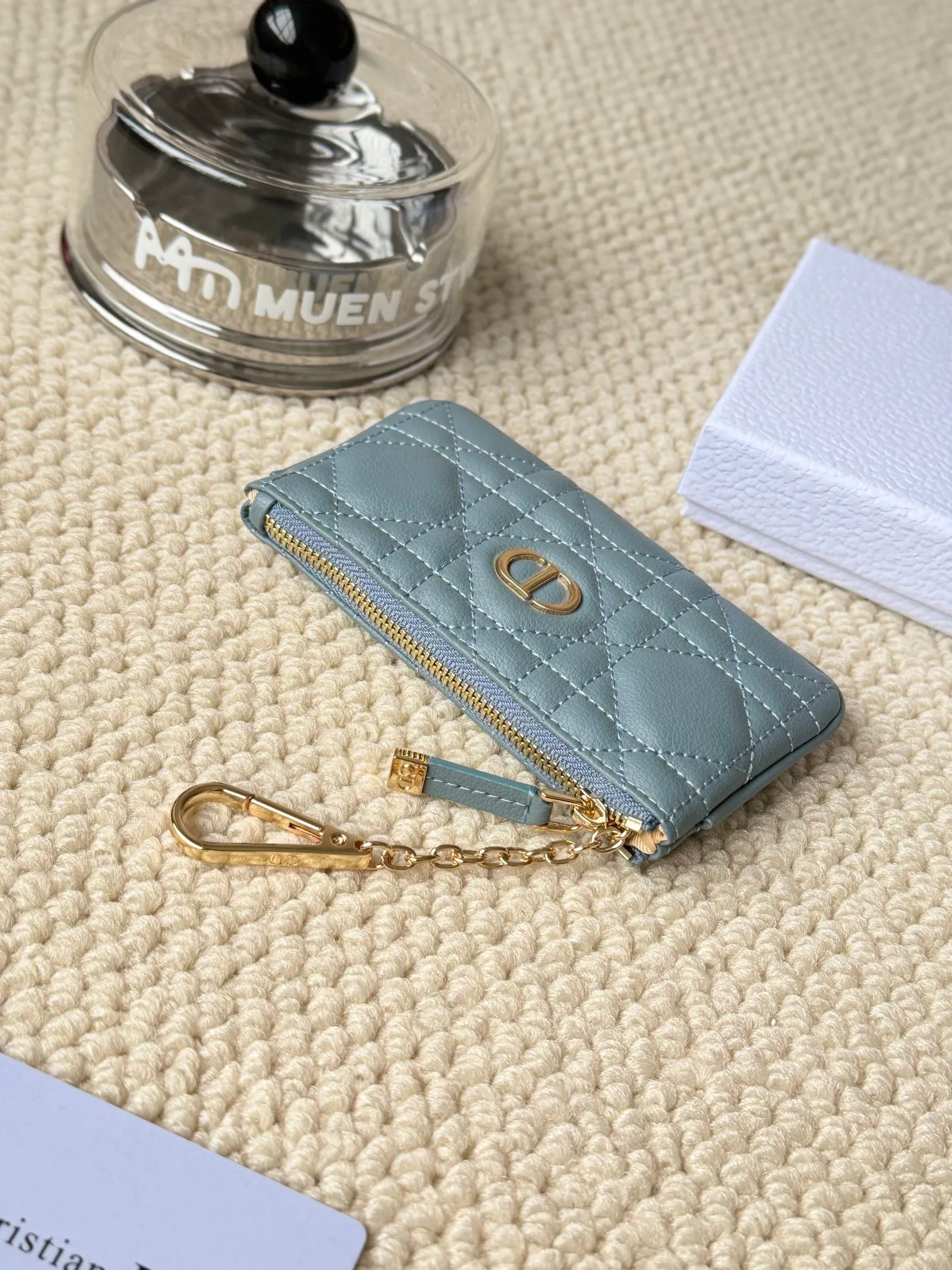 💰150 2024 spring and summer new coin purse key bag is small and cute Size: 14.5*7.6cm Model: S5158UWHC_M30G This Dior Caro card holder is elegant and practical. Carefully crafted from soft cow leather, it is decorated with cannage pattern topstitching and a CD logo on the front to enhance the style. Elegant and sophisticated. 30 Montaigne Glycine Coin Purse Key Case 🔑 Compact and practical, unique, it can store various daily necessities, suitable for various occasions, and can be matched with its 30Montaigne items. CD logo on front
