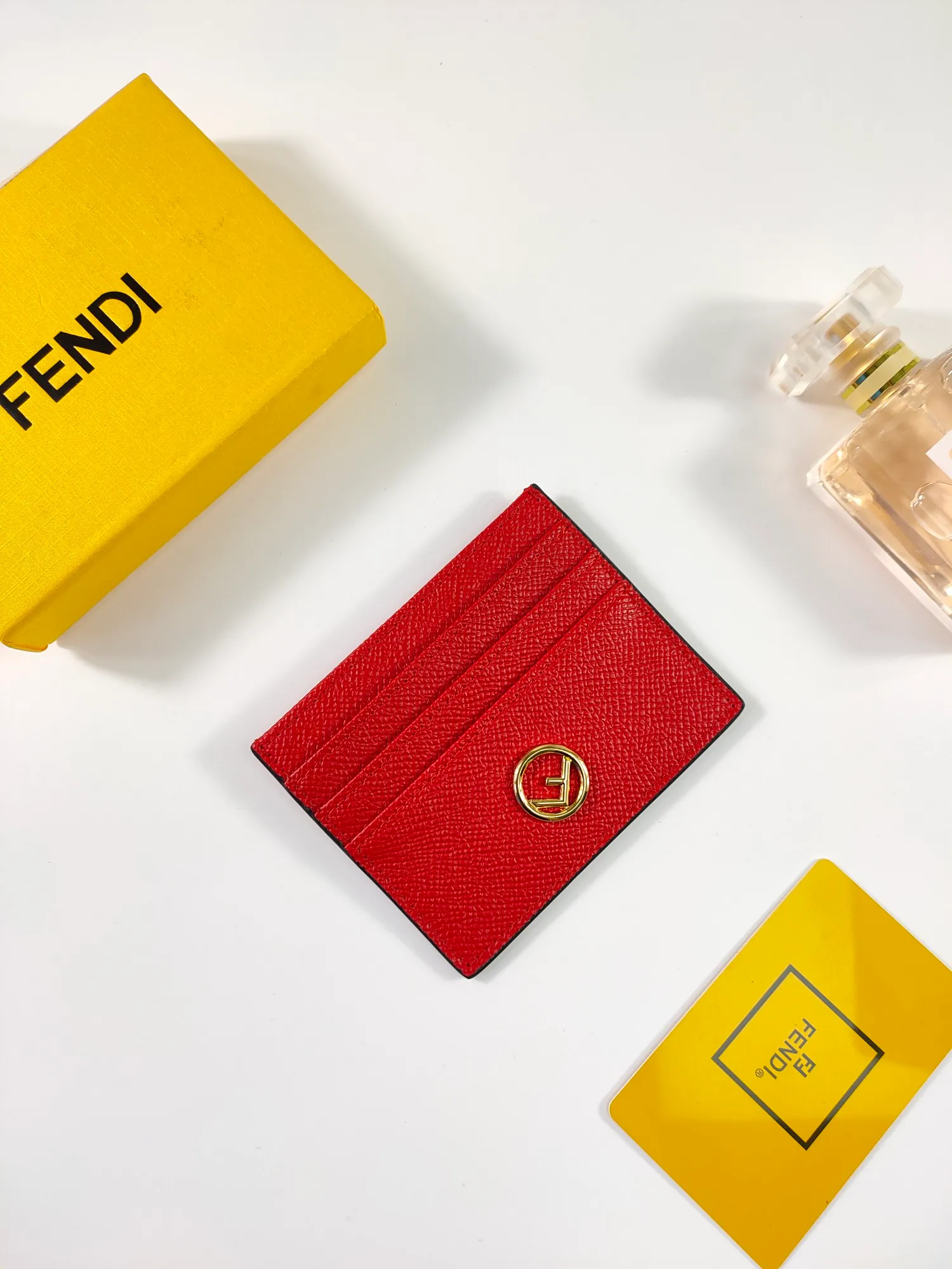 ￥90 Fendi "F is Fendi" card holder 😍 Has a middle compartment and six card slots [Celebration] Fendi Roma logo and internal label [Lip] Made of black calfskin. New Fendi logo with gold finish [Rose] Style number: 0445 Palm print Size: 10*8cm