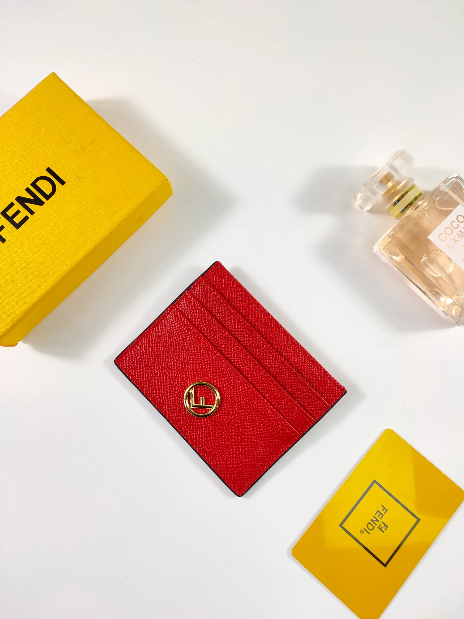￥90 Fendi "F is Fendi" card holder 😍 Has a middle compartment and six card slots [Celebration] Fendi Roma logo and internal label [Lip] Made of black calfskin. New Fendi logo with gold finish [Rose] Style number: 0445 Palm print Size: 10*8cm