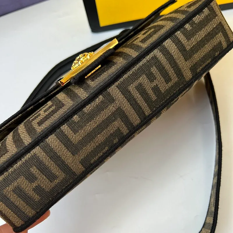 All Categories Official Website "Brand Women's Bags" Women's Bags 💙 FENDI The latest FendiVersace co-branded model, the iconic Baguette medium handbag adopts a clamshell design and is equipped with FF magnetic buckle closure. Lined interior with zip pocket. Comes with a detachable handle or shoulder strap for cross-body or hand carry. Decorated with tonal FF logo embroidery. Contrasting brown leather trim