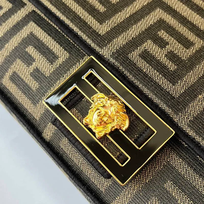All Categories Official Website "Brand Women's Bags" Women's Bags 💙 FENDI The latest FendiVersace co-branded model, the iconic Baguette medium handbag adopts a clamshell design and is equipped with FF magnetic buckle closure. Lined interior with zip pocket. Comes with a detachable handle or shoulder strap for cross-body or hand carry. Decorated with tonal FF logo embroidery. Contrasting brown leather trim