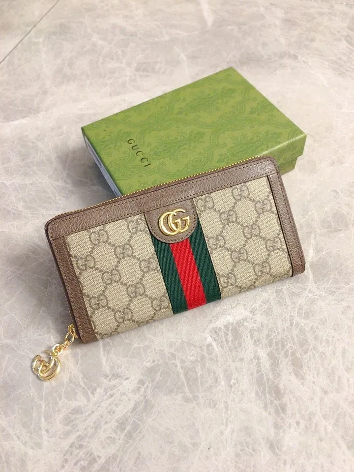 💰410 🇭🇺🇭🇺 The official website is synchronized with the new model! Ophidia series ~ long zipper clip, 🧤🧤 is made of GG Supreme high-grade PVC fabric 🧤🧤 with iconic double G hardware marks, classic red and green webbing, exquisitely made! 🧤🧤Model number: 523154, size: W19xH10xD3cm, color: coffee