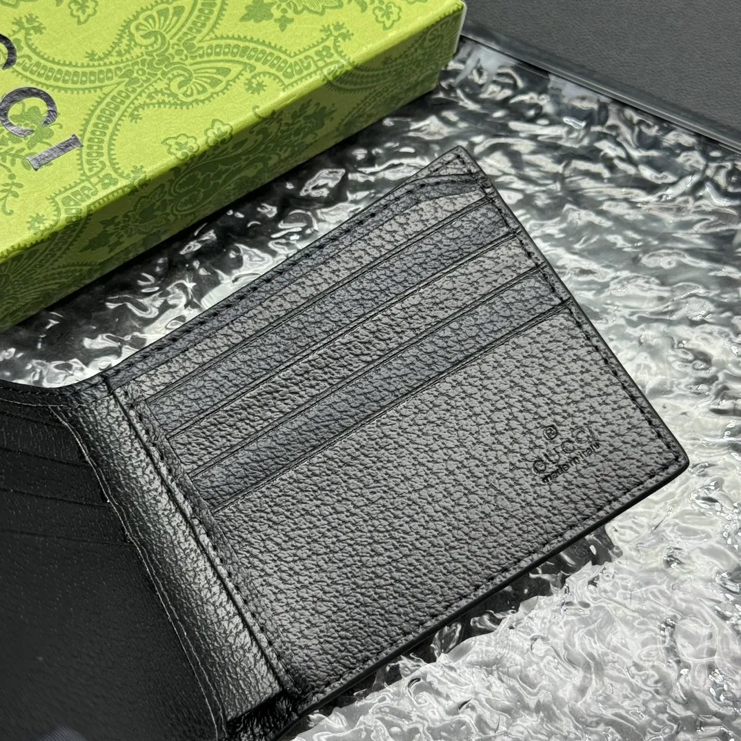 💰120 💎Top original version 🇮🇹GG Marmont series leather bi-fold wallet, Gucci continues to update the color matching, adding more refined tones. In new colors and combinations, the brand uses a modern perspective to reinterpret the classic GG Marmont series. This bifold wallet is crafted from black leather with branded hardware in gold-tone. Black leather, gold-tone hardware, Double G, eight card slots, two bill compartments. Model: 523664. Dimensions: 11x9