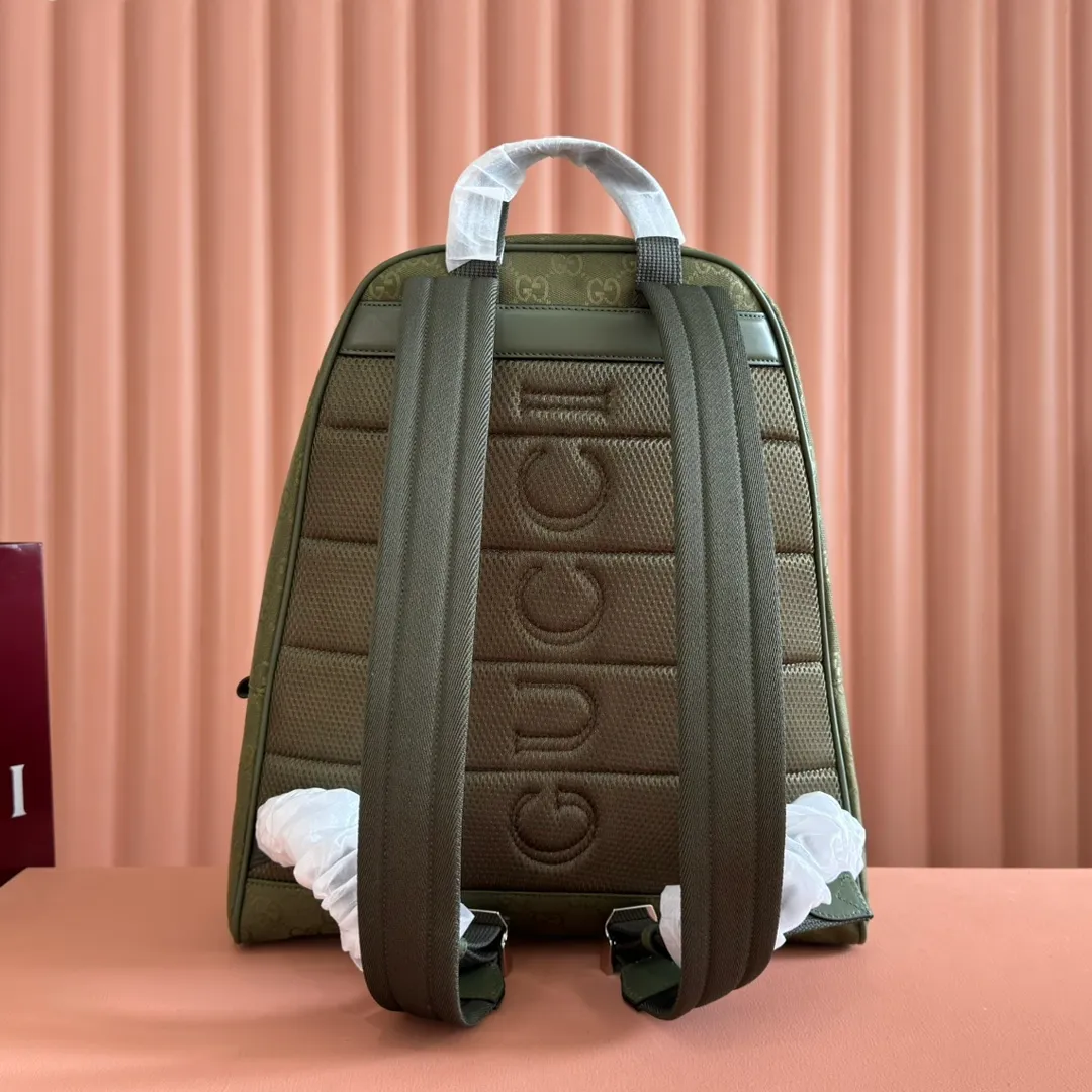 p1240. 💋💋💋【With full set of original counter packaging】【New Product】This backpack is crafted with GG canvas to pay tribute to the instantly recognizable monogram pattern of Guccio Gucci, the founder of the brand. Interpreting a new forest green tone, it adds a modern touch to daily accessories, and the webbing details double the charm of the entire design. Forest green GG canvas Forest green leather trim Red and green web detail Gucci branding on the back Nylon lining Padded mesh on the back Adjustable padded shoulder strap Interior: 1 padded laptop compartment, 1 open pocket External: One zippered pocket Handle height: 8 cm Zipper closure Ident number: 834464. Dimensions: 35cm (width) x 40cm (height) x 20cm (depth) Weight: approx. 1.3kg Color: Forest green cloth. Made in Italy