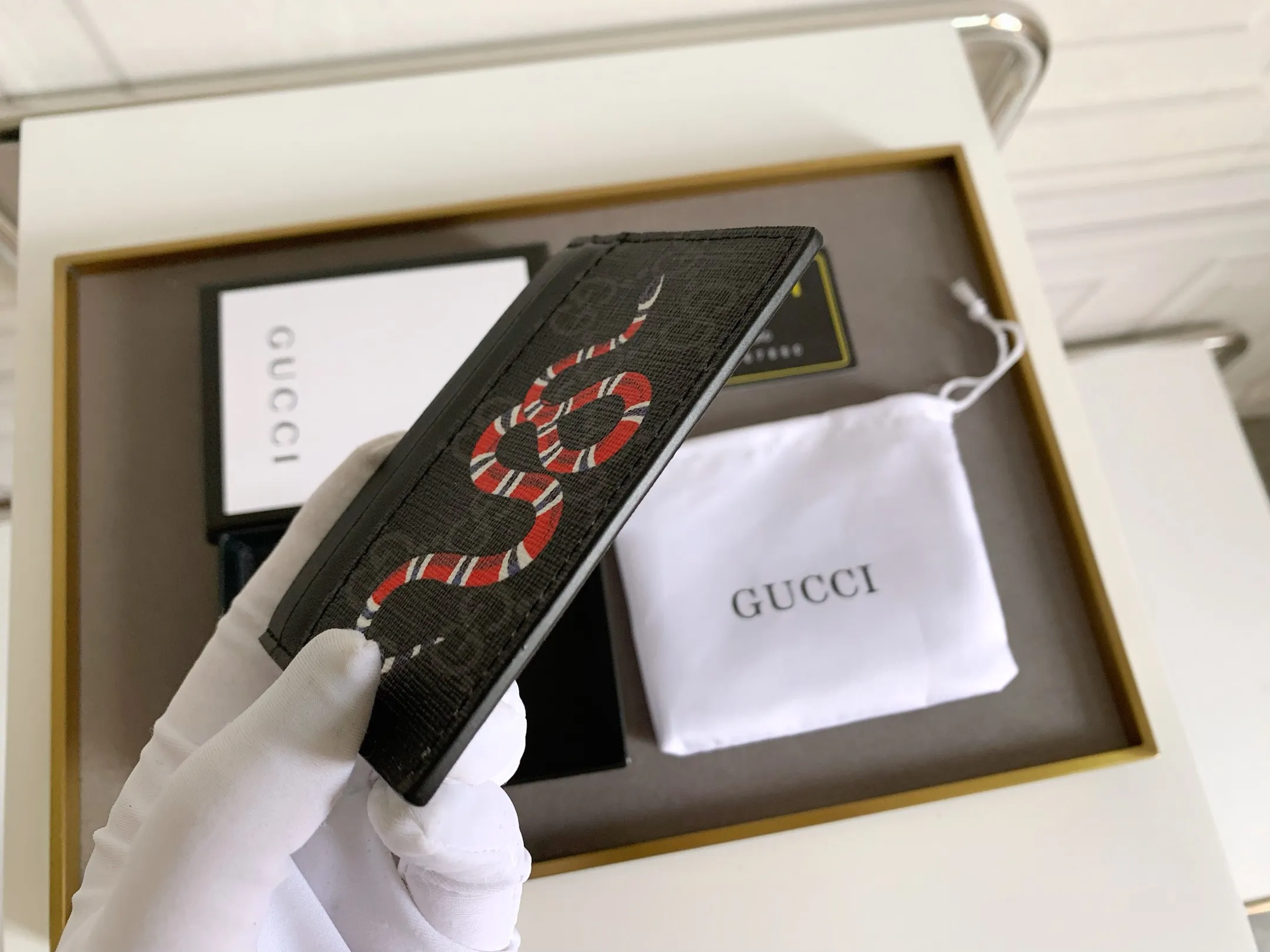 💰90 💎(Snake pattern) Top original quality, GUCCI classic popular printed card holder, exclusive background, real shot. The card holder is made of GG Supreme high-grade man-made canvas with exquisite patterns💯! Style number: 451277 Size: 10x7.5cm