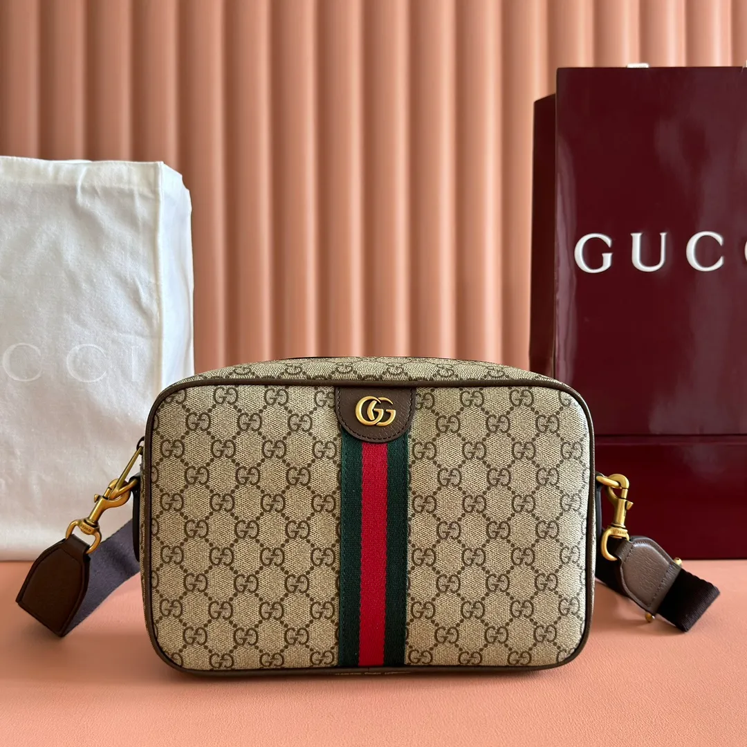 p1020💋💋💋"With full set of original counter packaging" [New Product] The Ophidia series combines beige and brown colors, with classic silhouettes and new functions, and is made of soft-touch fabrics. This cross-body bag is made of coated fabric with a GG monogram pattern and is intricately embellished with the Double G logo and webbing details. Beige and dark brown GG monogram coated fabric Dark brown leather trim Gold-tone hardware Dark green linen-cotton blend lining Double G Web detail Interior: One open pocket Adjustable canvas shoulder strap (height: 43 cm; length: 89 cm - 128 cm) Zip closure Ident.: 834468. Dimensions: 28.5cm (width) x 18cm (height) x 7.5cm (depth) Weight: approx. 0.74kg Color: Brown/PVC. Made in Italy
