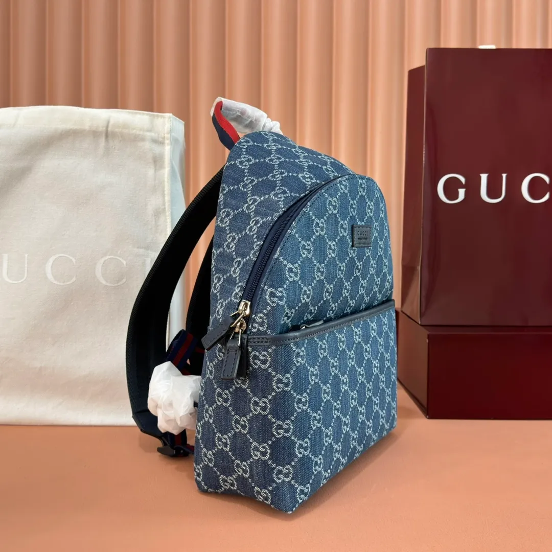 p1000💋💋💋"With full set of original counter packaging" [New Product] The 2025 early autumn children's series presents a series of well-loved patterns such as classic logo details. This GG denim fabric backpack draws inspiration from the design of the adult series and is ingeniously embellished with a "Made in Italy" leather label to highlight the brand's connotation. Blue and ivory GG denim, dark blue leather piping, red and blue webbing "Gucci Made in Italy" leather label, adjustable shoulder strap, zippered inner pocket, zippered outer pocket, top handle, zipper fly. Model number: 782708. Dimensions: 32cm (H) x 25cm (W) x 11cm (D) Colour: Blue denim. Made in Italy