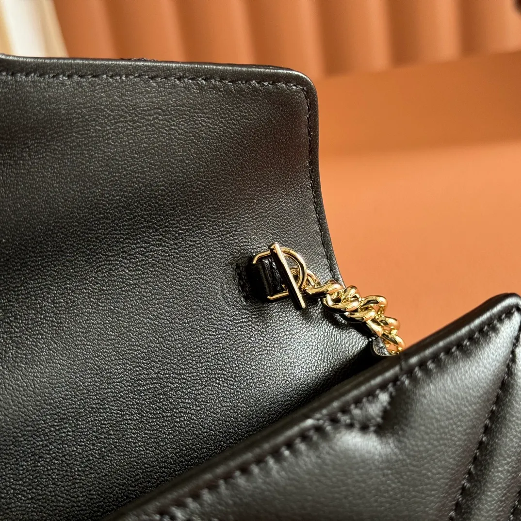 p760. 💋💋💋"With full set of original counter packaging" [New product] This GG Marmont series chain wallet is crafted with Matelassé cow leather. The series' iconic double G accessories make the entire design fuller. Black quilted V-shaped calfskin Leather Light gold-tone hardware Black taffeta lining Double G Interior: six card compartments, one zip pocket and one flap pocket Chain shoulder strap (60 cm high) Press-button closure Ident.: 837745. Dimensions: 20cm (width) x 12cm (height) x 4cm (depth) Weight: approx. 357g