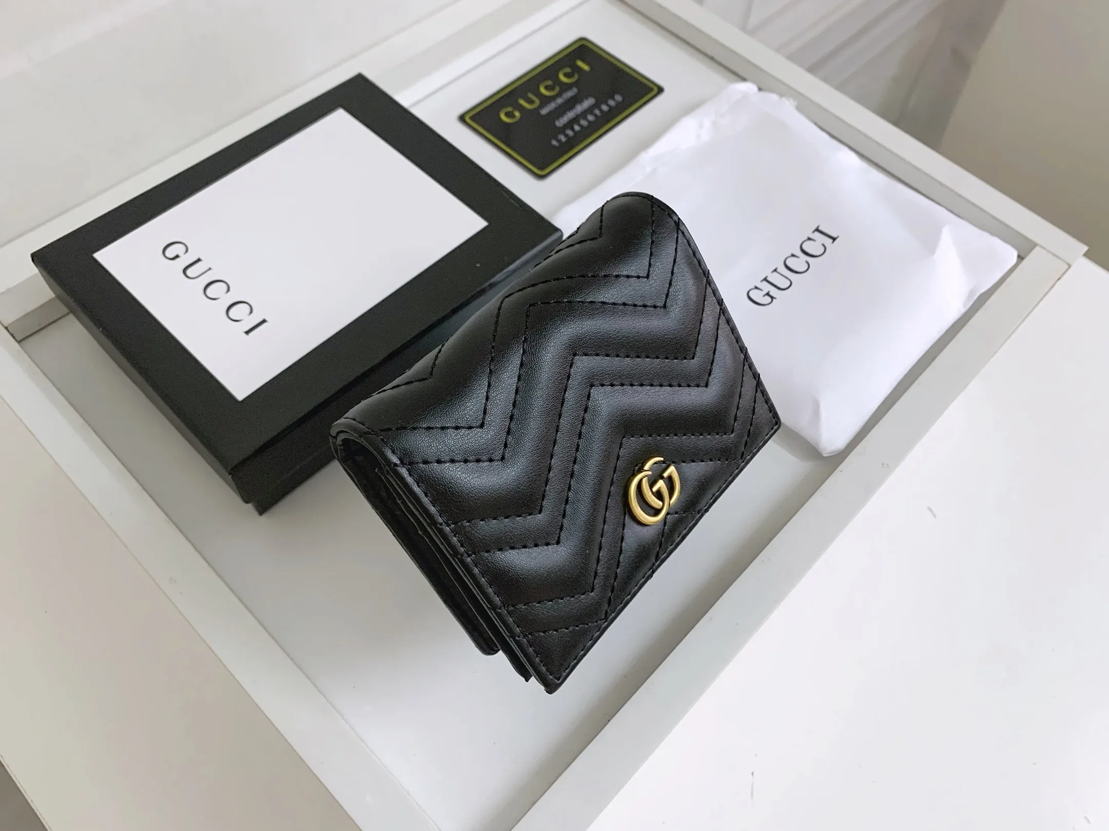 💰150 💎 Top original leather #black❤️ New model from GUCCI, counter quality, original single leather, real shot. 2021 Early Autumn New Style🔥 GG Marmont Series❣ Flip-top card holder😘 Made of soft quilted V-shaped leather 👍 Refined with top overseas hardware😍! Model: 466492 Size: 11x8.5x3cm.