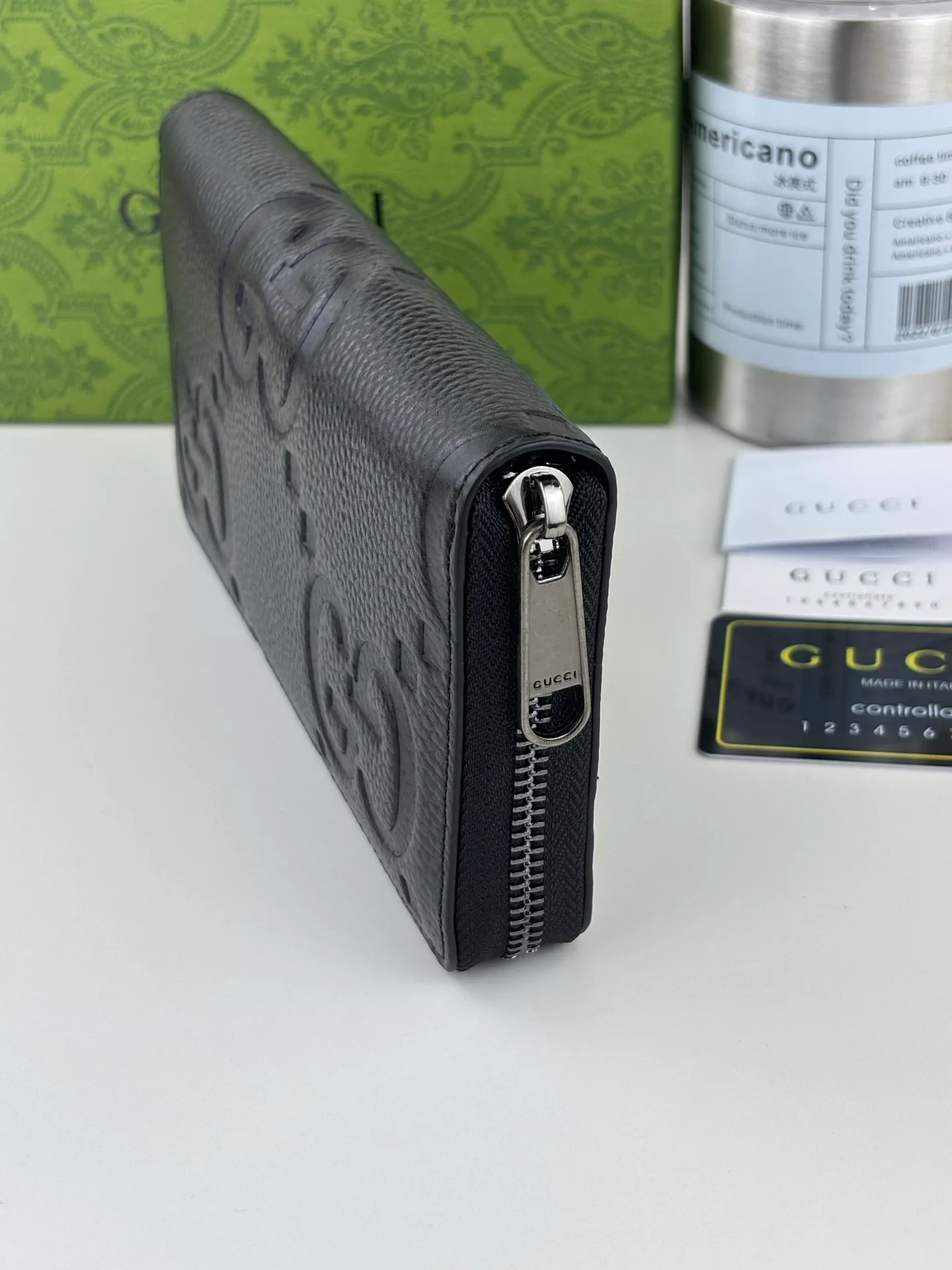 💰170 GUCCl Super Double G full zipper wallet. GG print embossing turns small daily items into fashionable daily accessories. Novel textures and finishes continue to shine in Gucci's new series, showing vitality and individual charm. This full-zip wallet is crafted from leather and features an oversized Double G logo throughout. Super Double G leather, moiré fabric lining, interior: 12 card compartments, 3 bill compartments and 1 zipped coin pocket, zip closure. Style number: 739484 Size: 19cm x 10cm x 2.5cm Color: Black pressed G