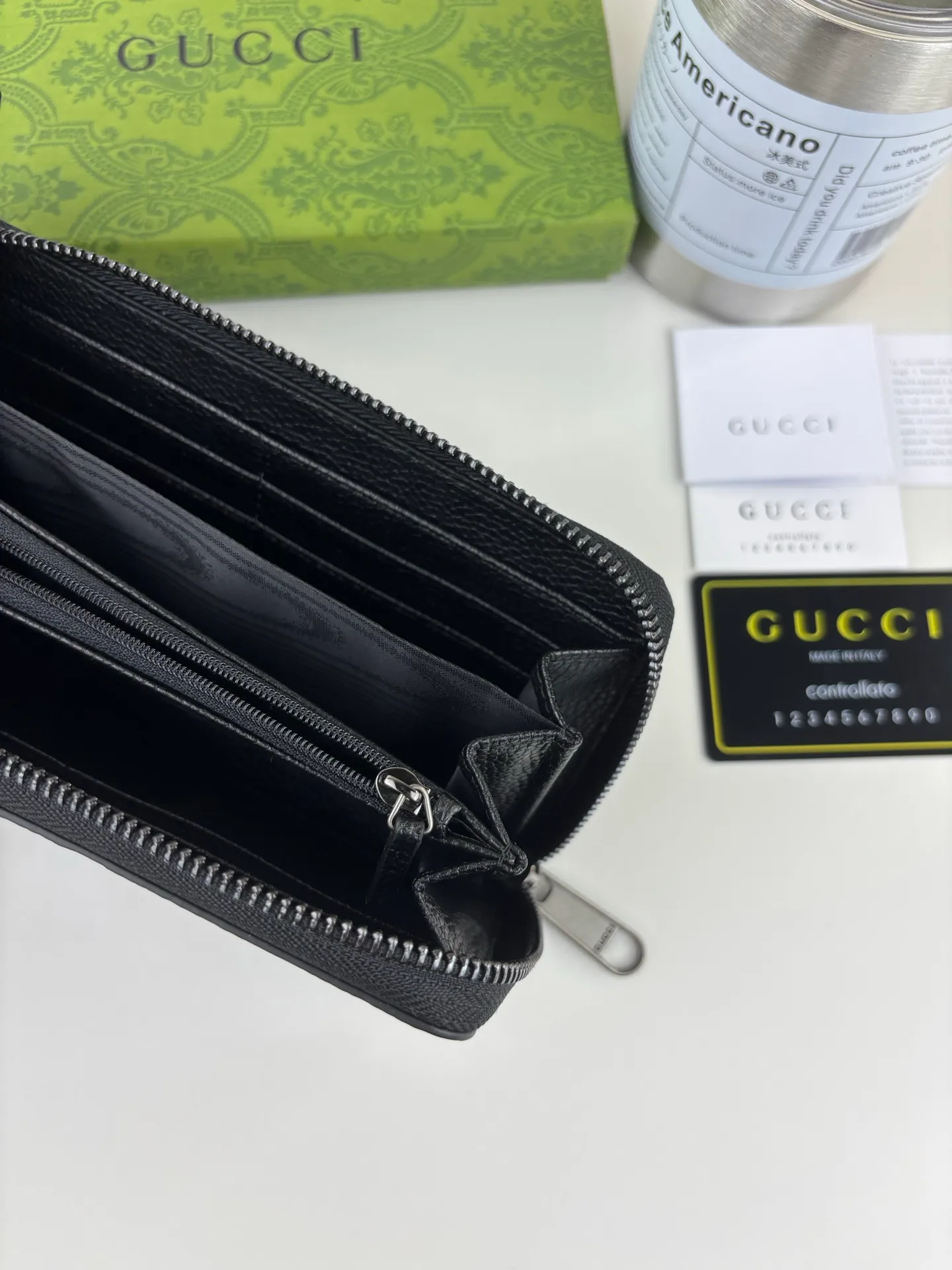 💰170 GUCCl Super Double G full zipper wallet. GG print embossing turns small daily items into fashionable daily accessories. Novel textures and finishes continue to shine in Gucci's new series, showing vitality and individual charm. This full-zip wallet is crafted from leather and features an oversized Double G logo throughout. Super Double G leather, moiré fabric lining, interior: 12 card compartments, 3 bill compartments and 1 zipped coin pocket, zip closure. Style number: 739484 Size: 19cm x 10cm x 2.5cm Color: Black pressed G
