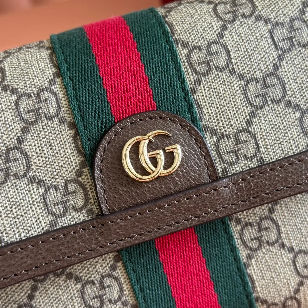p920. 💋💋💋"With full set of original counter packaging" [New product] The Ophidia series combines two colors of beige and dark brown, with classic silhouettes and new functions, and is made of soft-touch fabrics. This mini bag is made of coated fabric with a GG monogram pattern and is intricately embellished with the Double G logo and web details. Beige and dark brown GG monogram coated fabric Dark brown leather trim Gold-tone hardware Brown moiré fabric lining Double G Web detail Interior: Two card compartments Adjustable canvas shoulder strap (height: 36cm - 66cm) Magnetic snap closure Ident No.: 838599. Dimensions: 18.5cm (width) x 12cm (height) x 5cm (depth) Color: Brown/PVC. Made in Italy