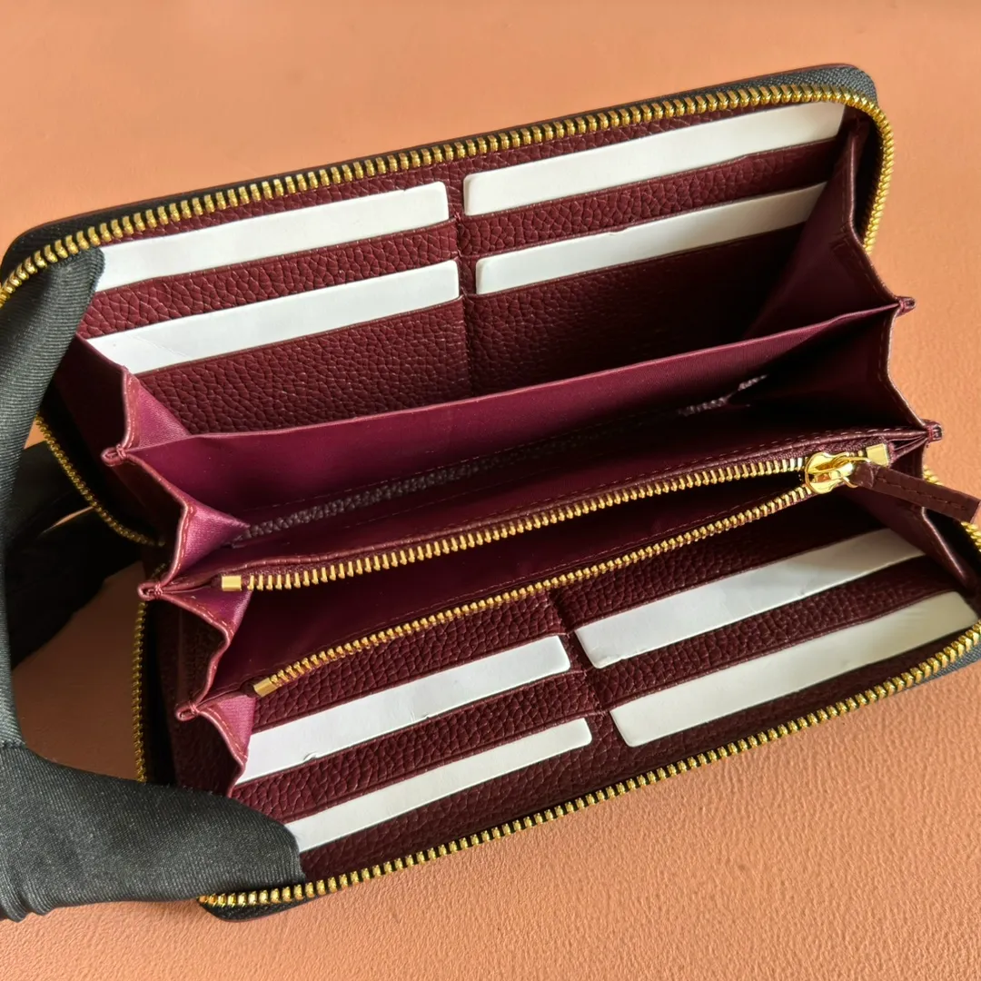 p460. 💋💋💋"With full set of original counter packaging" [New product] Full zipper wallet with small double G metal details. Exquisitely crafted from textured cow leather. Anchor red with light pink cow leather, gold metal hardware, Double G, twelve card compartments and three bill compartments, zippered coin pocket, full zipper closure, weight: approx. 0.23 kg, model number: 456117. Dimensions: 10.5cm (L) x 19cm (W) x 2cm (D) Color: Anchor Red/Black. Made in Italy