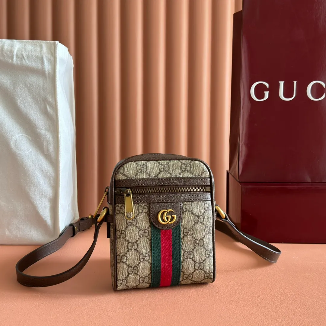 p740. 📣📣📣[Original leather accessories🌈 Equipped with full set of counter packaging]🔥🔥 Introduction to the new model of G family: Immersed in retro sentiments, the Ophidia family has welcomed a new member - the square shape of the medium handbag is reminiscent of retro design. The GG high-grade man-made canvas material is embellished with red and blue webbing and other classic elements of the brand, which reflect the tribute to the brand's equestrian roots. Ophidia Web Model: 598127. Size: 14.5*18*6cm. Color: brown/PVC