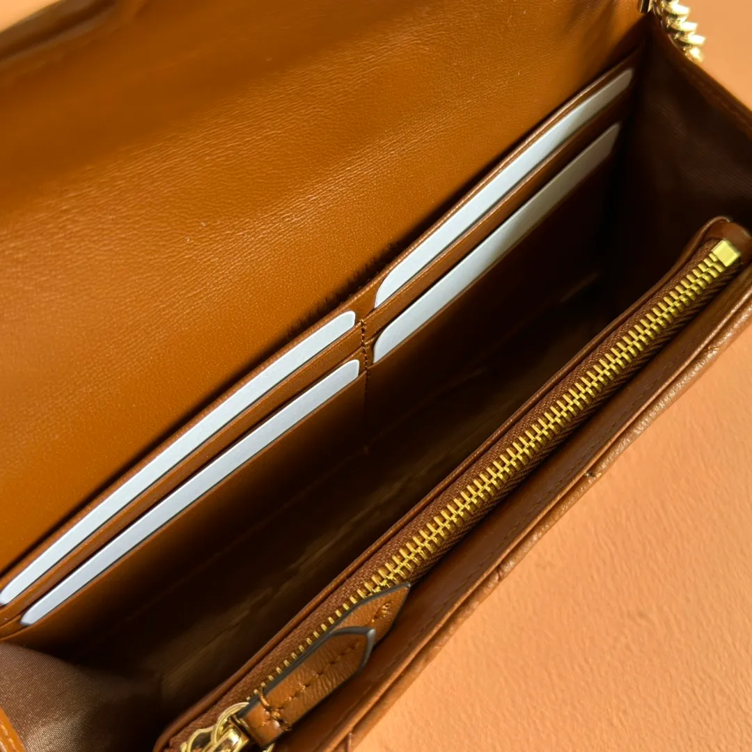 p760. 💋💋💋"With full set of original counter packaging" [New product] This GG Marmont series chain wallet is crafted with Matelassé cow leather. The series' iconic double G accessories make the entire design fuller. Black quilted V-shaped calfskin Leather Light gold-tone hardware Black taffeta lining Double G Interior: six card compartments, one zip pocket and one flap pocket Chain shoulder strap (60 cm high) Press-button closure Ident.: 837745. Dimensions: 20cm (width) x 12cm (height) x 4cm (depth) Weight: approx. 357g