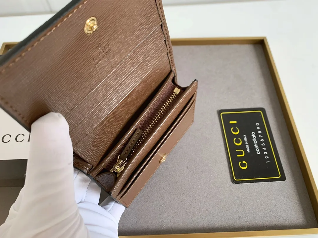 💰150 Top Original 💎gucci·leather ‼ ‼ Made of imported original leather, grained cow leather, paired with ebony double G fabric, and gold hardware accessories. Model: 523155 Brown Size 11cm*8.5cm*2.5cm