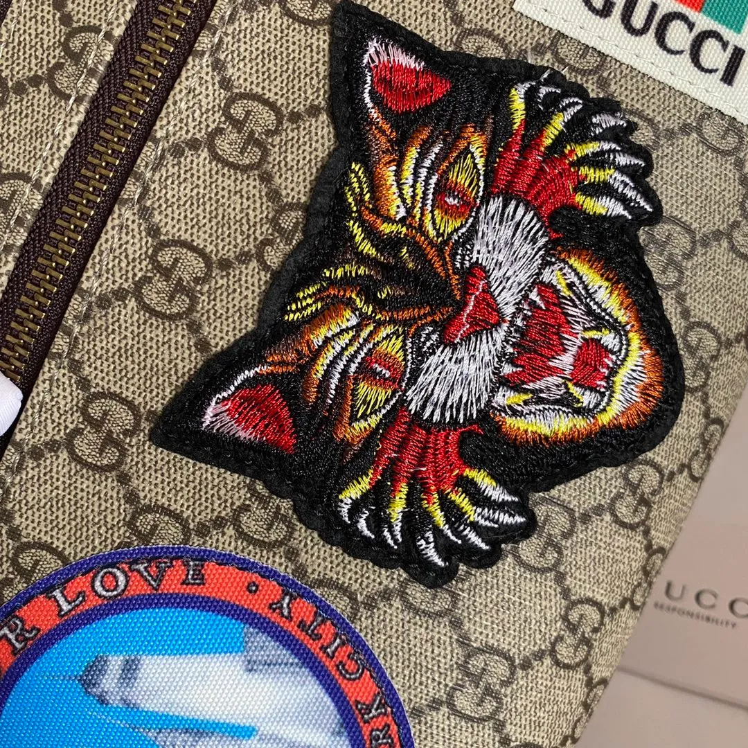 Actual shot #💰260 Model: 529711 embroidered tiger Size: 28x18x8cm. GG ophidia Travel has always been one of the brand's sources of inspiration. Decorated with a variety of fashionable embroidery and retro-style details such as planets. Retro airmail piping and Gucci retro logo taken from archive designs. Chest bag✅waist bag✅