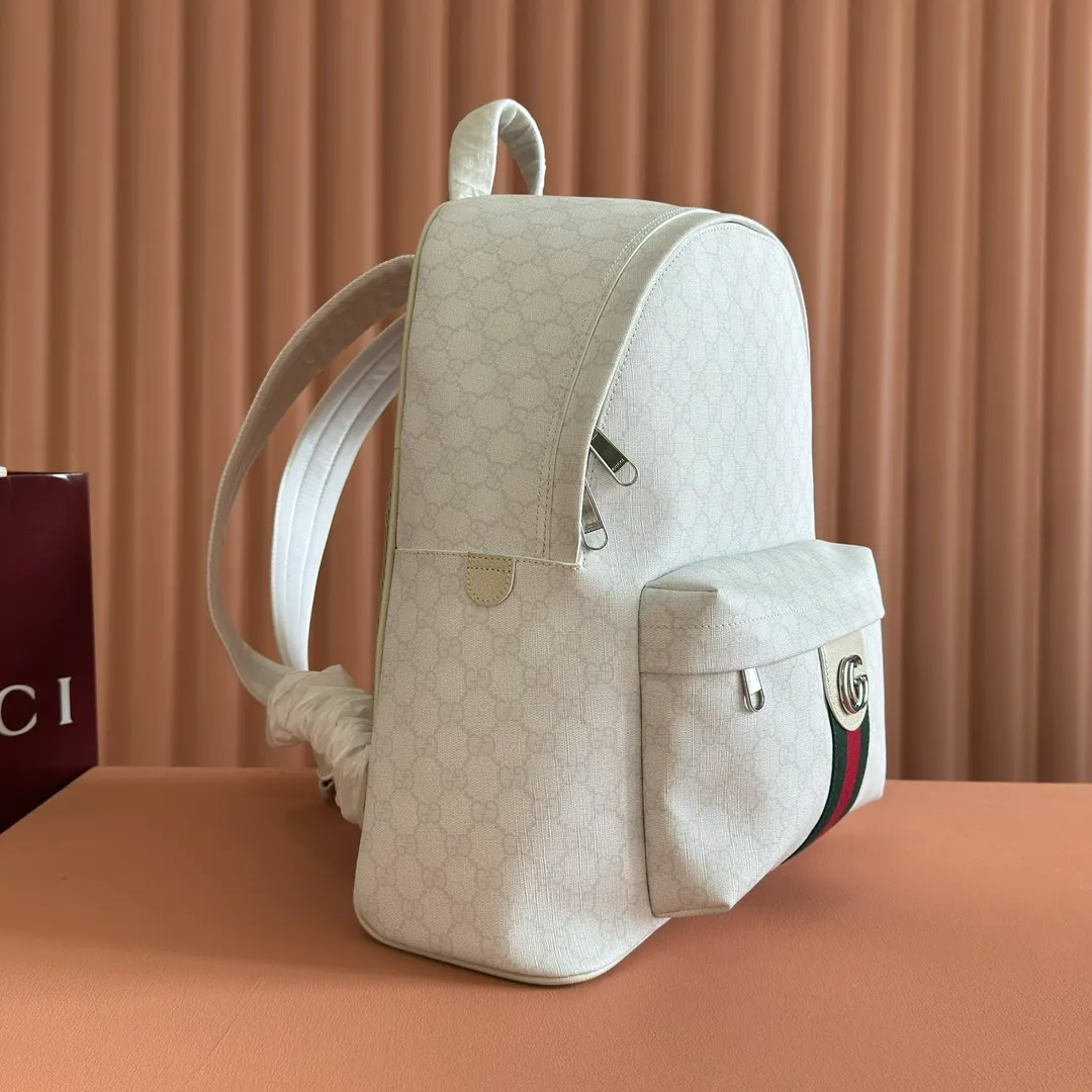 p1260💋💋💋"With full set of original counter packaging" [New product] The Ophidia series is crafted with white color matching, classic silhouette and new functional design, and is made of soft-touch fabrics. This backpack is made of soft GG Supreme material and is intricately embellished with the Double G logo and red and green webbing details. White soft GG Supreme canvas Palladium tone hardware Green nylon lining Double G Web detail Padded mesh at back Adjustable shoulder strap Interior: 1 zip pocket External: 1 zip pocket Handle height: 8 cm Zip closure Ref.: 834466. Dimensions: 36.5cm (width) x 41cm (height) x 18cm (depth) Weight: approx. 1.5kg Color: white pvc. Made in Italy