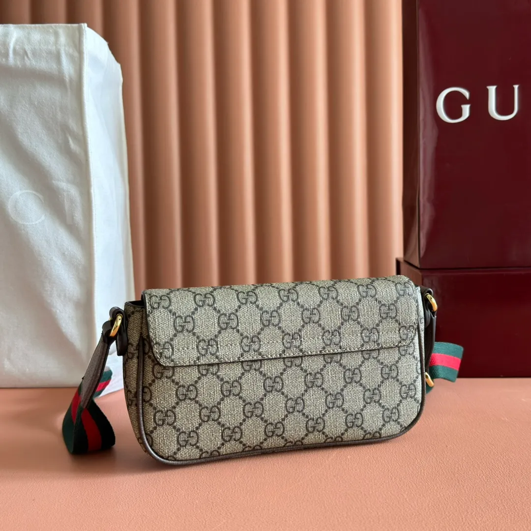 p900🔥🔥🔥[Original leather - equipped with counter packaging] The GUCCI Ophidia series continues to grow and develop, and a variety of unique shapes and materials will be launched every season. Crafted in beige and ebony GG Supreme canvas, this mini bag features Double G hardware and a webbing shoulder strap. Model 764961 is made of counter-quality imported cowhide and matched with genuine open-plate copper hardware. Dimensions-13x22x4cm