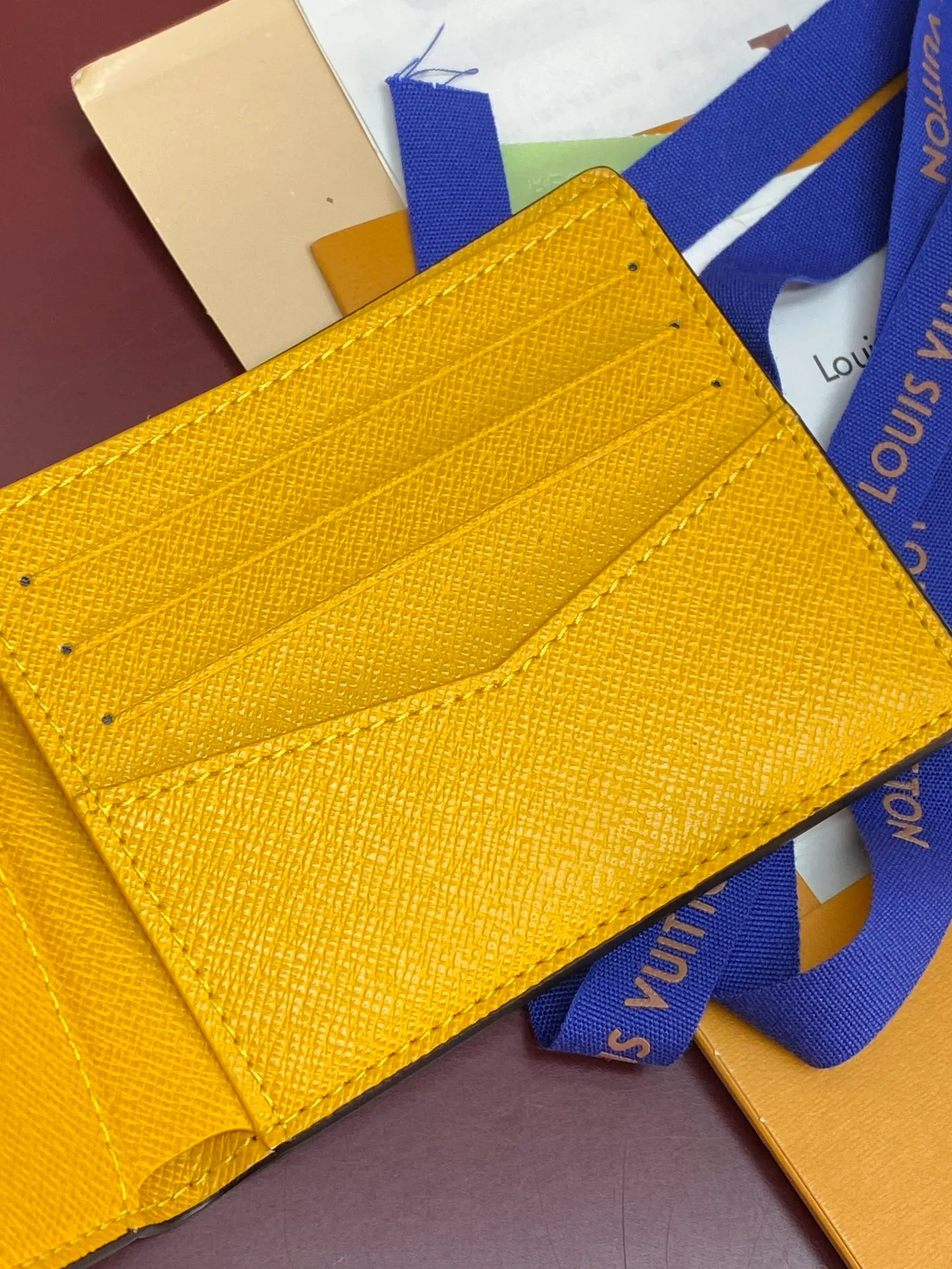 M25795 Multiple Wallet, this Multiple wallet is made of Monogram Heritage canvas, with a contrasting leather lining, and part of the lining is decorated with a colorful stripe print. Monogram Heritage is Pharrell Williams' reinterpretation of the original Damier pattern, integrating its warp and weft plaid into the Monogram pattern, adding a modern style. The wallet features multiple business card slots and compartments, making it easy to fit in your pocket.  11.5 x 9 x 1.5 cm (length x height x width). 💰340