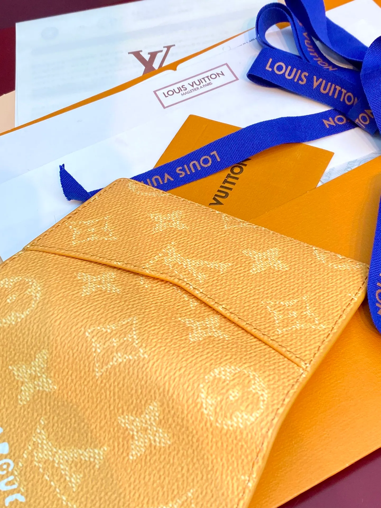 M12659 Yellow! Pocket wallet, this pocket wallet is made of Monogram Heritage coated canvas, which is integrated with classic elements such as the vertical and horizontal texture of Damier check and the Marque L.Vuitton Déposée logo, showing Pharrell Williams' modern interpretation of the Monogram pattern.  11.1 x 1 x 7.5 cm (height x width x length). 💰320