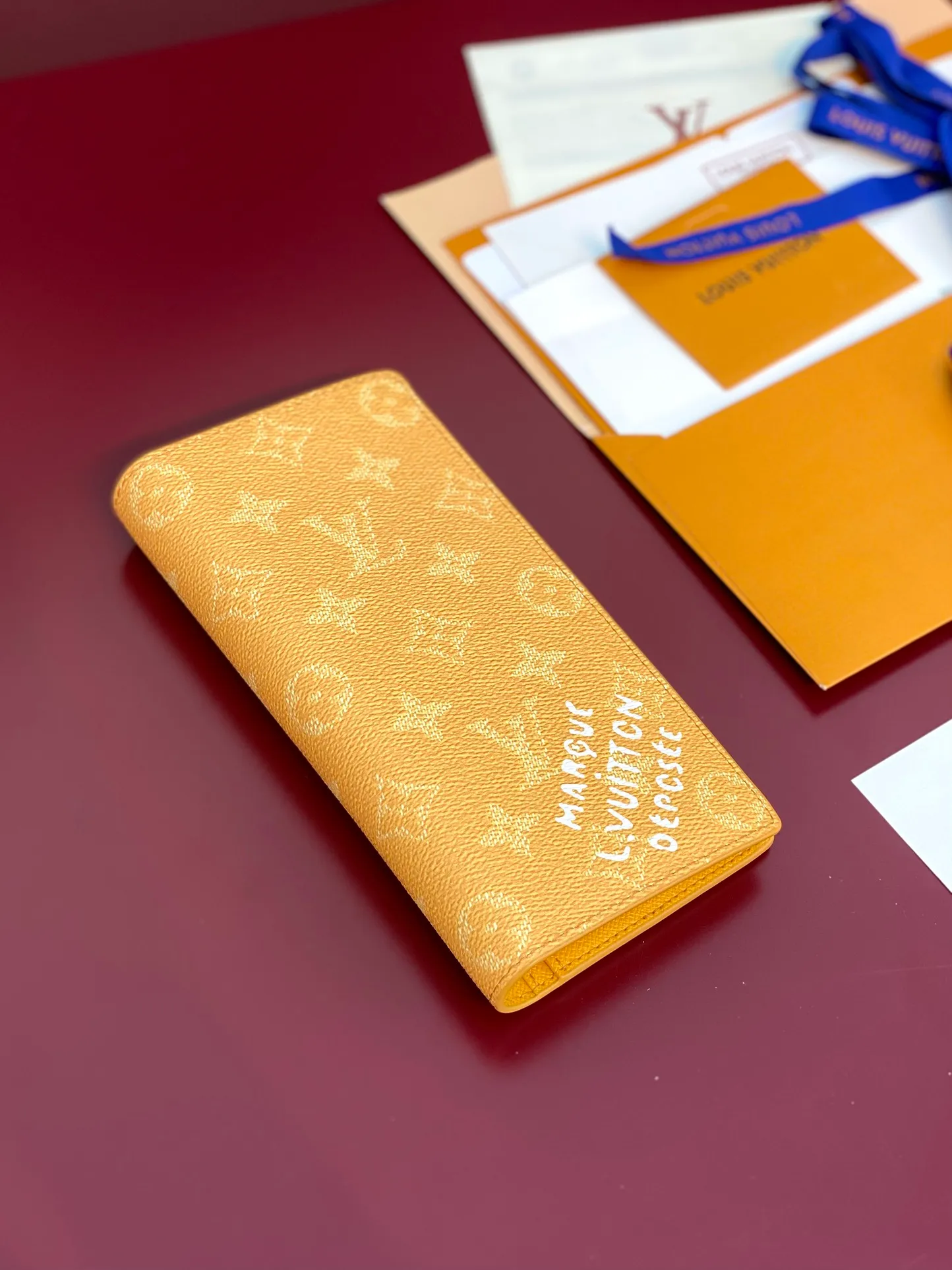 M12656 Yellow! BRAZZA Wallet, this Brazza Wallet is made of Monogram Heritage canvas, witnessing Pharrell Williams' new interpretation of the iconic Monogram pattern. Criss-crossing textures and the Marque L.Vuitton Déposée logo reflect classic elements of the original Damier print, while multiple card slots and compartments complete the long design without sacrificing functional details.  19 x 2 x 10 cm (height x width x length). 💰380