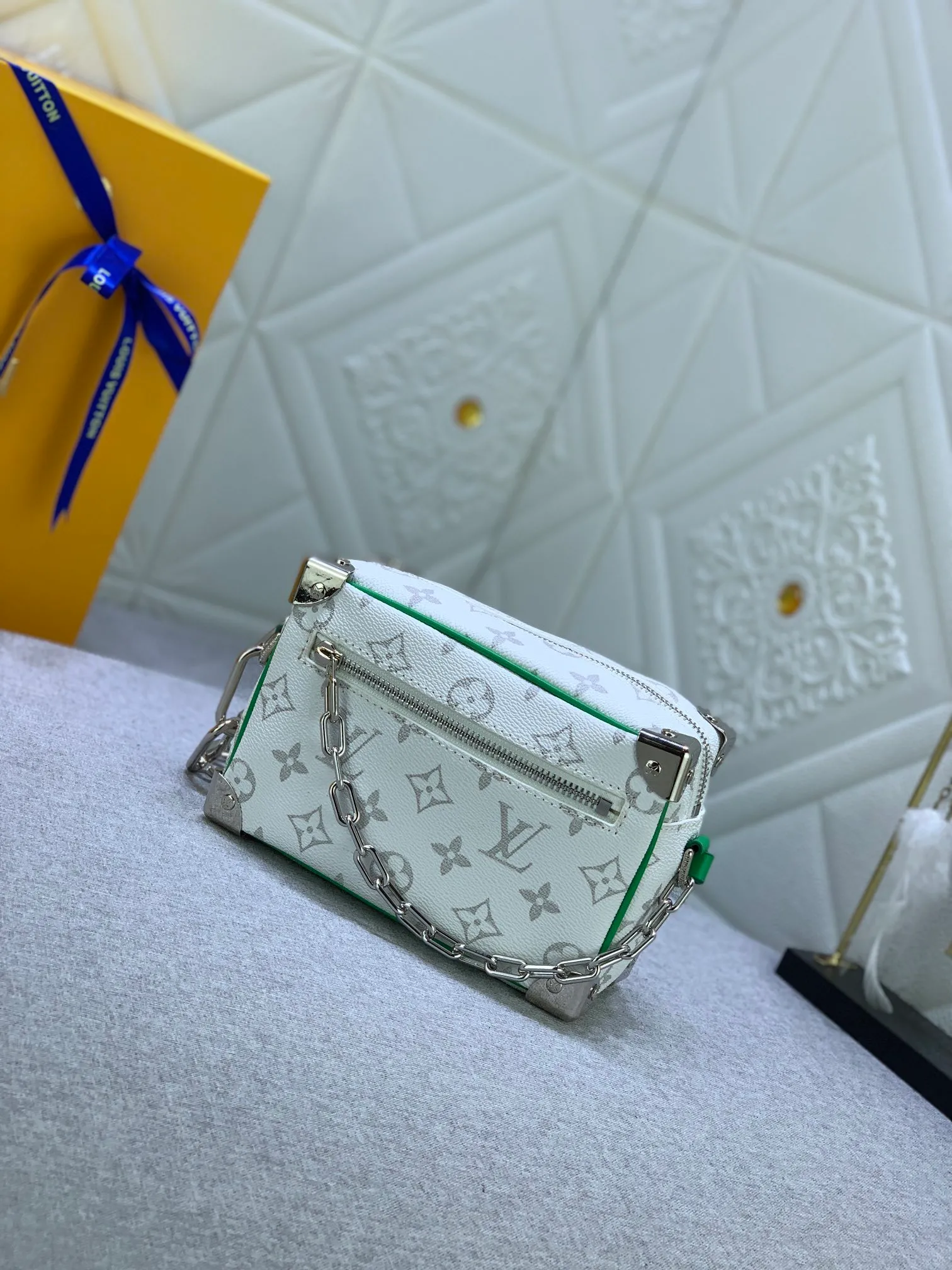 All Categories Official Website "Brand Women's Bags" Women's Bags 💙 LV has the new "Louis Vuitton!" signature printed on its vintage Monogram canvas and chunky chain, a mini soft trunk bag that is part of Virgil Abra's everyday LV capsule of the Men's Fall/Winter 2021-22 collection. Boxy shape and eight pieces of hardware to reinforce the corners. Can