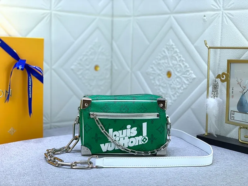 All Categories Official Website "Brand Women's Bags" Women's Bags 💙 LV has the new "Louis Vuitton!" signature printed on its vintage Monogram canvas and chunky chain, a mini soft trunk bag that is part of Virgil Abra's everyday LV capsule of the Men's Fall/Winter 2021-22 collection. Boxy shape and eight pieces of hardware to reinforce the corners. Can
