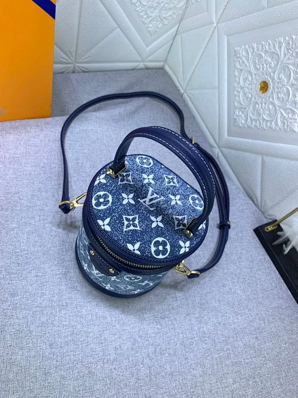 All Categories Official Website "Brand Women's Bags" Women's Bags 💙 LV upgraded original gradient denim blue cannes fortune bag. Drawing on the shape of a long-standing makeup box, women's art director Nicolas Ghesquière recreates the classic charm of the past with this semi-rigid handbag. Monogram and Monogram Reverse