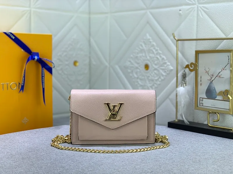 All Categories Official Website "Brand Women's Bags" Women's Bags 💙 LV This Mylockme Pochette chain bag is made of soft cow leather and continues the core elements of the Lockme series with an envelope-style flap, front pocket and LV letter hook. The trendy construction is suitable for storing mobile phones and other essentials, and the long chain allows for shoulder or cross-body wear. Detailed