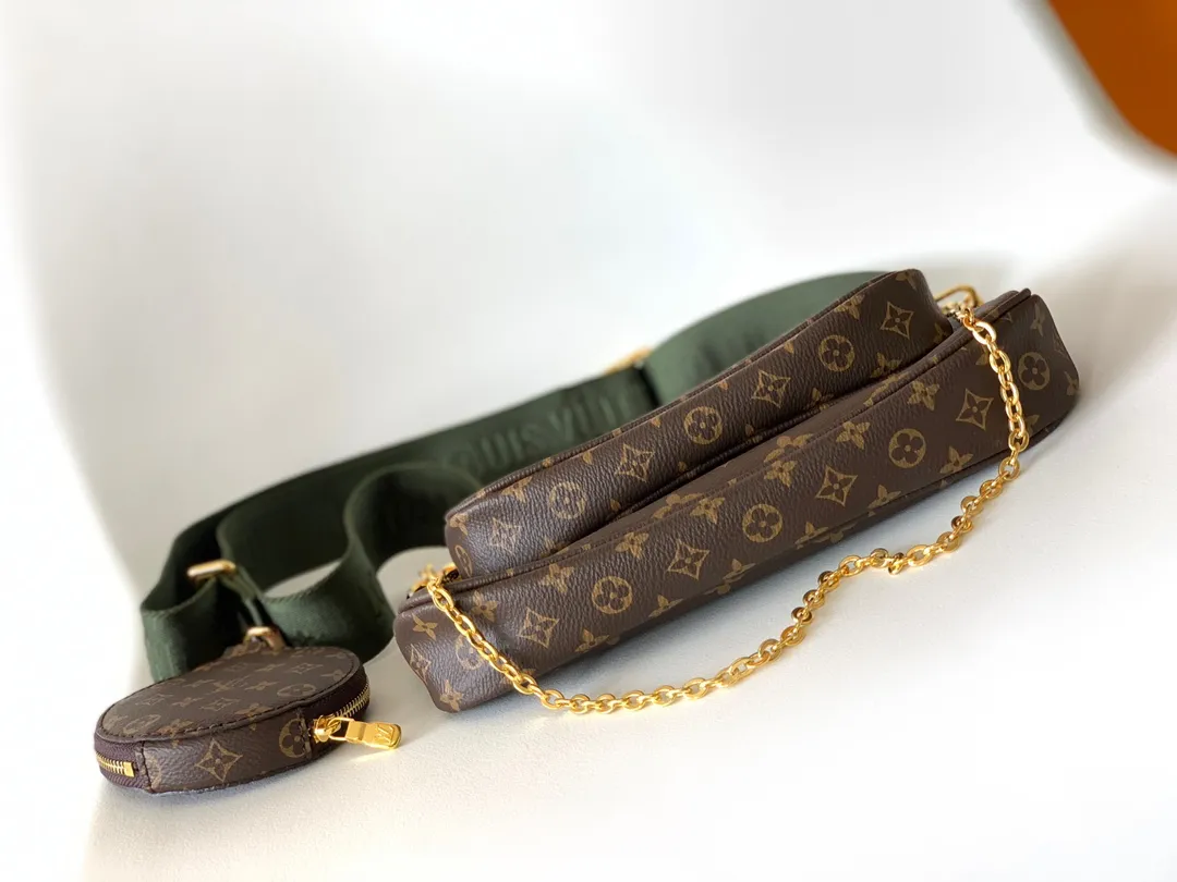 Factory price 460 core-changing chip [Top original order] [M44813 green/M44840 pink/M44823. Multi Pochette Accessories handbags are made of Monogram canvas to form a dynamic three-piece design, and are equipped with multiple pockets and compartments. Adjustable gold-tone chain and Louis Vuitton monogram jacquard shoulder strap for cross-body wear Monogram coated canvas Natural cowhide leather trim Textile lining Gold-tone hardware Adjustable shoulder strap for shoulder or cross-body wear Detachable chain shoulder strap with D-ring 24.0 x 16.0 x 6.0 cm (L x H x W)