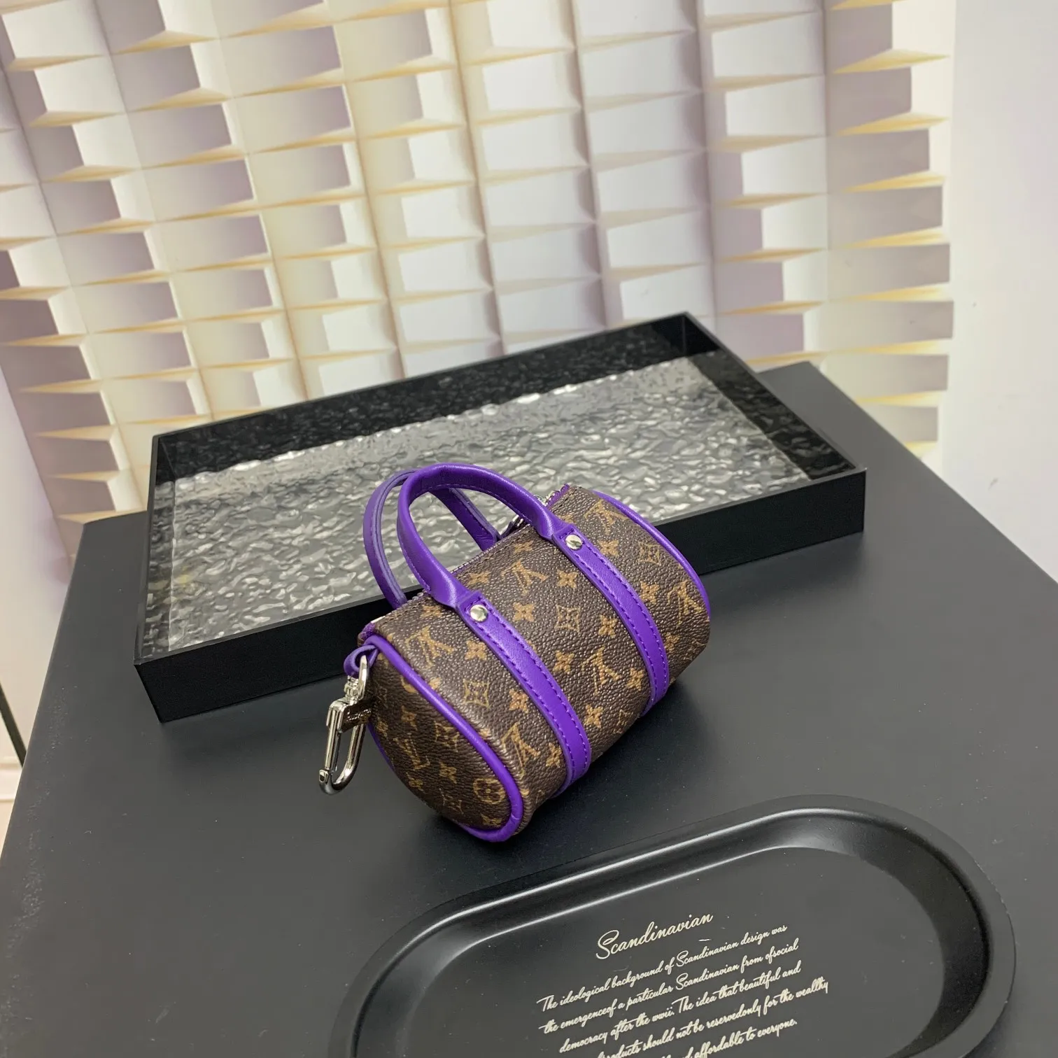 💰200 shipped😍 MINI KEEPALL bag charm and keychain ☀️Louis Vuitton Louis Vuitton lv mini pillow bag pendant ☀️This Mini Keepall bag charm and keychain condenses the classic handbag configuration, boldly showing the spirit of adventure. Monogram canvas with LV inscribed hook buckle, whether hung on a belt or handbag, its zipper closure and built-in keychain ensure secure storage