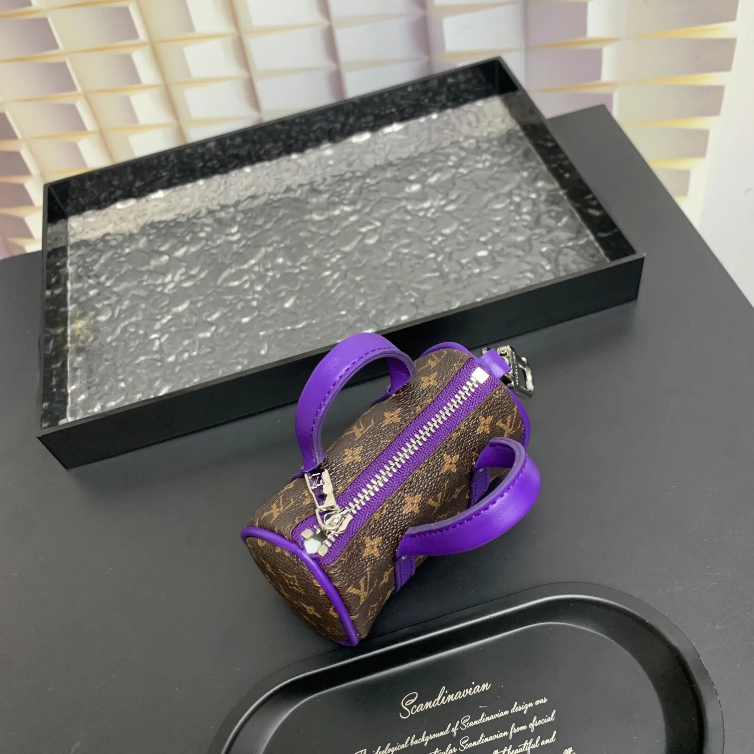 💰200 shipped😍 MINI KEEPALL bag charm and keychain ☀️Louis Vuitton Louis Vuitton lv mini pillow bag pendant ☀️This Mini Keepall bag charm and keychain condenses the classic handbag configuration, boldly showing the spirit of adventure. Monogram canvas with LV inscribed hook buckle, whether hung on a belt or handbag, its zipper closure and built-in keychain ensure secure storage
