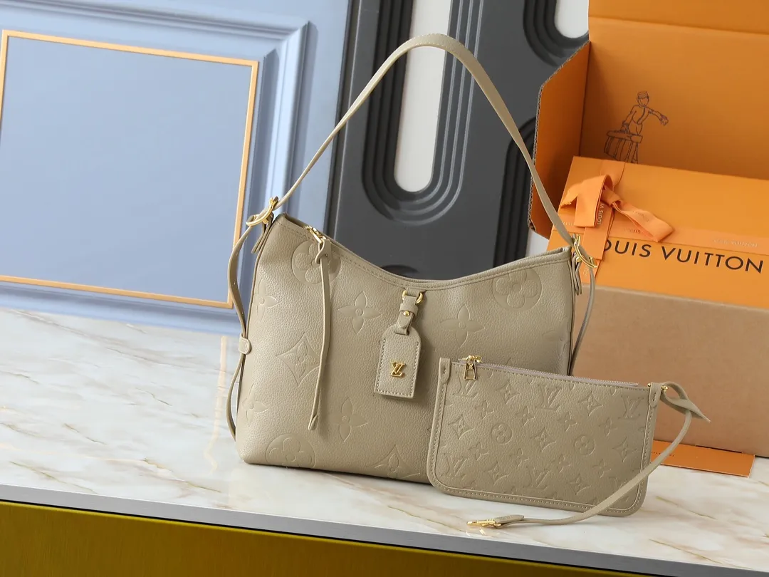 💰240💰Upgraded from the original M24141 M46288 M46293 M46277 M46298 M46203 CarryAll small handbag is made of Mono gram Empreinte embossed leather. It has a generous structure and a neat inner layer. The large inner bag adds functional elements. Comes with a Monogram embossed zipper clutch secured by a leather strap. A personal companion for urban life. Dimensions 29 x 24 x 12 cm (length x height x width)