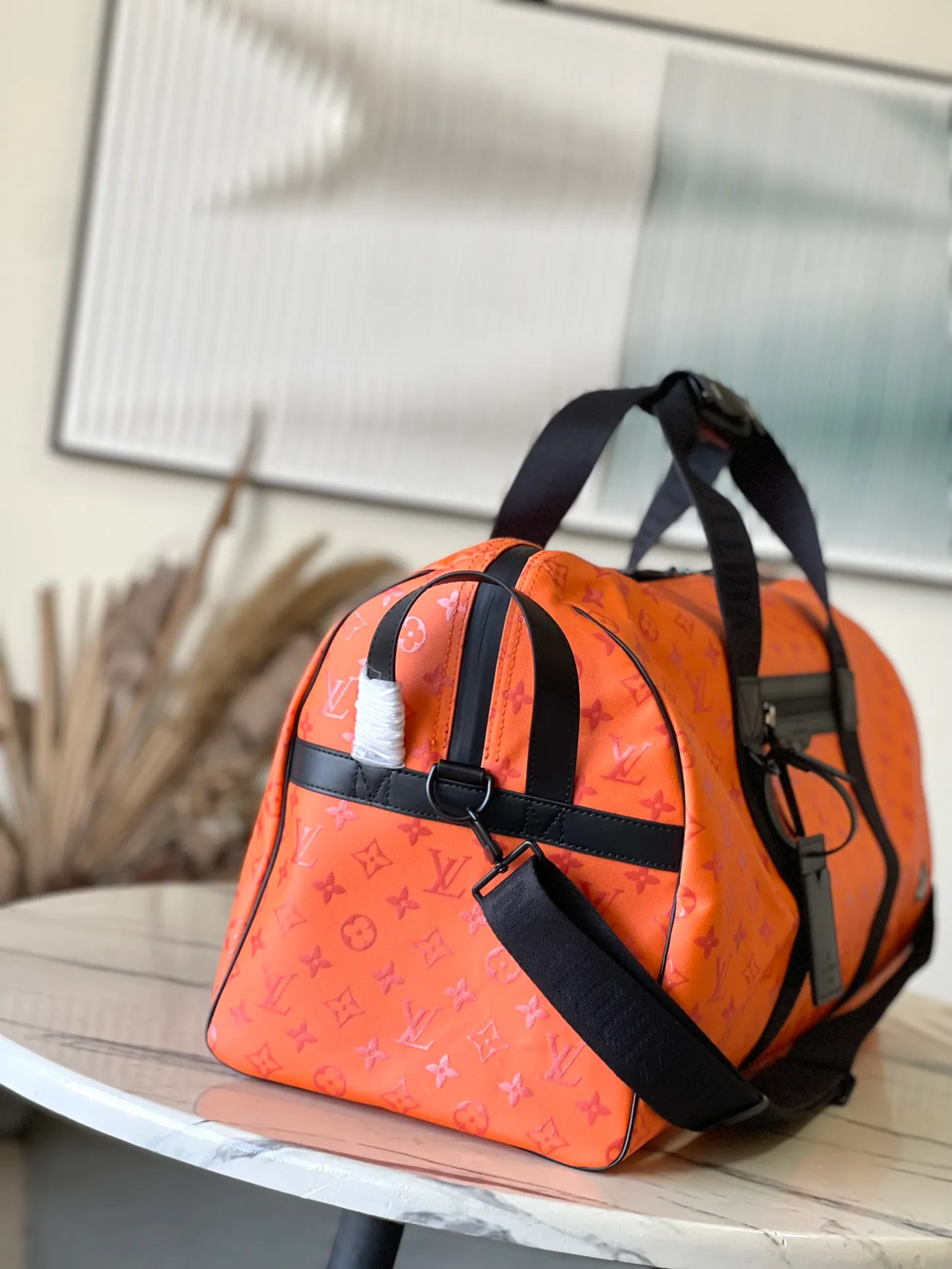 💰1480 Top Original Order M12724 This Keepall Sport travel bag is made of Monogram Storm coated canvas dip-dyed in eye-catching colors, with detachable shoulder straps and side straps to strengthen the structure, highlighting the dynamic style while achieving a comfortable carrying experience. Waterproof zippers keep items wet, and it's complemented by a fabric lining and zipped interior pocket. Dimensions: 55 × 31 × 25 cm