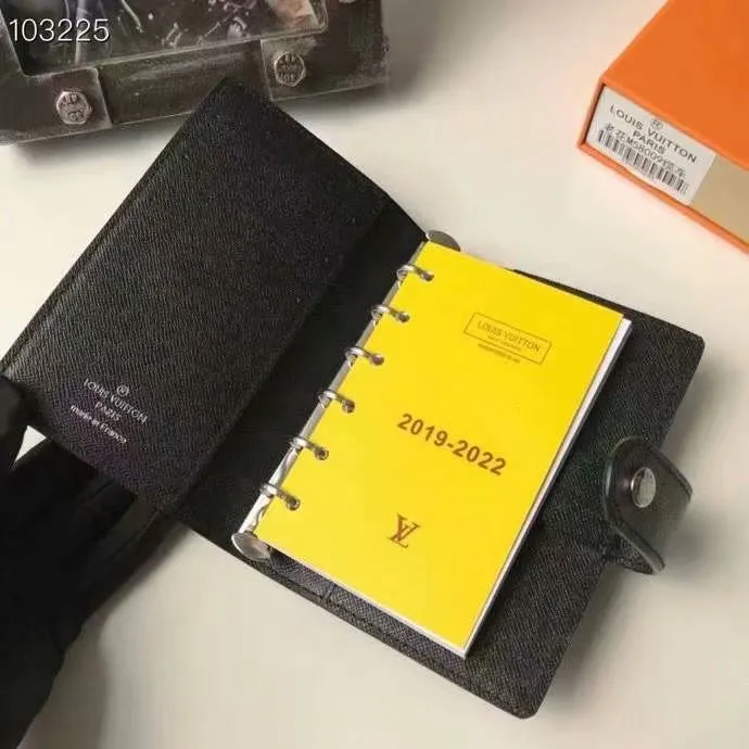 P140 Hot item shipped, model number M20005. This small notepad cover is made of Monogram canvas. It can hold three credit cards and can also be used as an address book, notebook or calendar. 10/12 cm (Length x Height) - Epi leather embossed with delicate LV initials and lined with interwoven textured leather - Button closure - Six-ring binder with three rings in sets, six credit card slots and two internal compartments - Notepad insert available separately