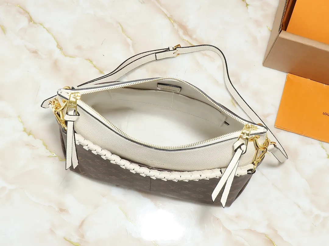 💰240💰Upgraded from the original M45522, 43170. This MONOGRAM canvas material is a new style of Melie handbag, a fashionable must-have item. Veau Cachemire leather material. Full leather embossed woven wrist double bag shopping bag. Lightweight and comfortable to carry. Unique vertical and narrow shape with modern style. Zipper pocket with metal engraved zipper puller for more personality. Size: 33x16x30cm